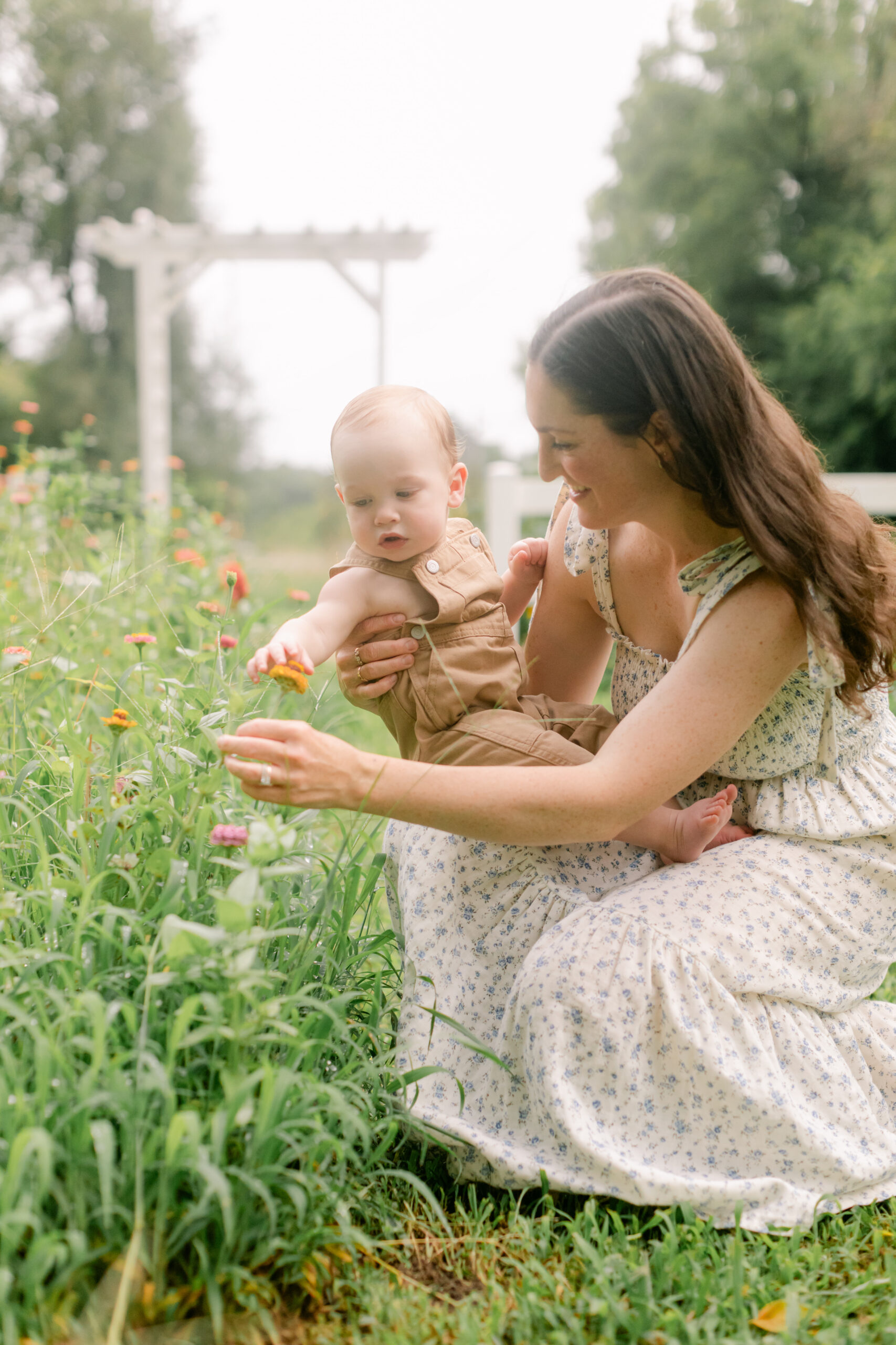 mama and baby boy in flower garden. motherhood minis photo session in nashville