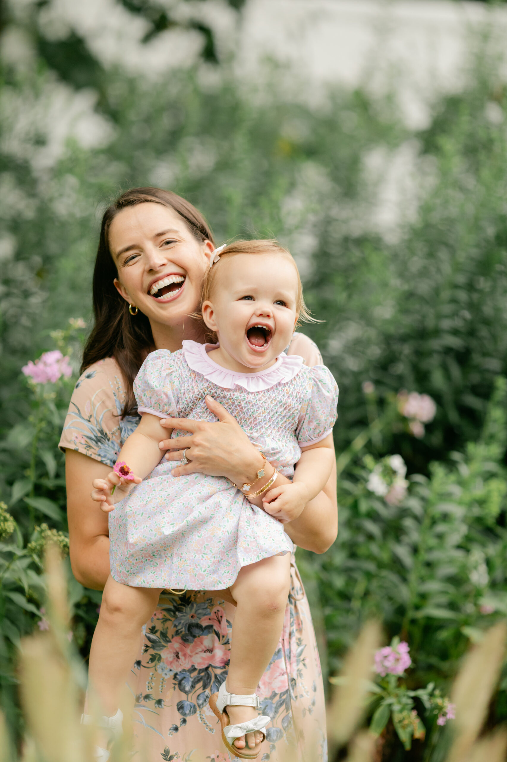 mama and baby girl in flower garden. motherhood minis photo session in nashville