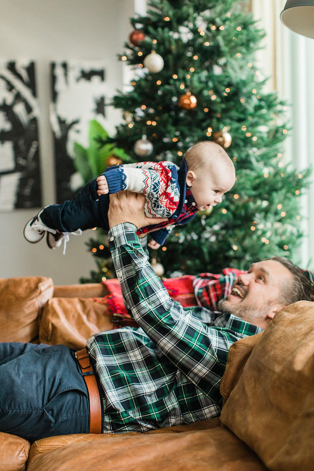 dad and son. christmas family photos in living room