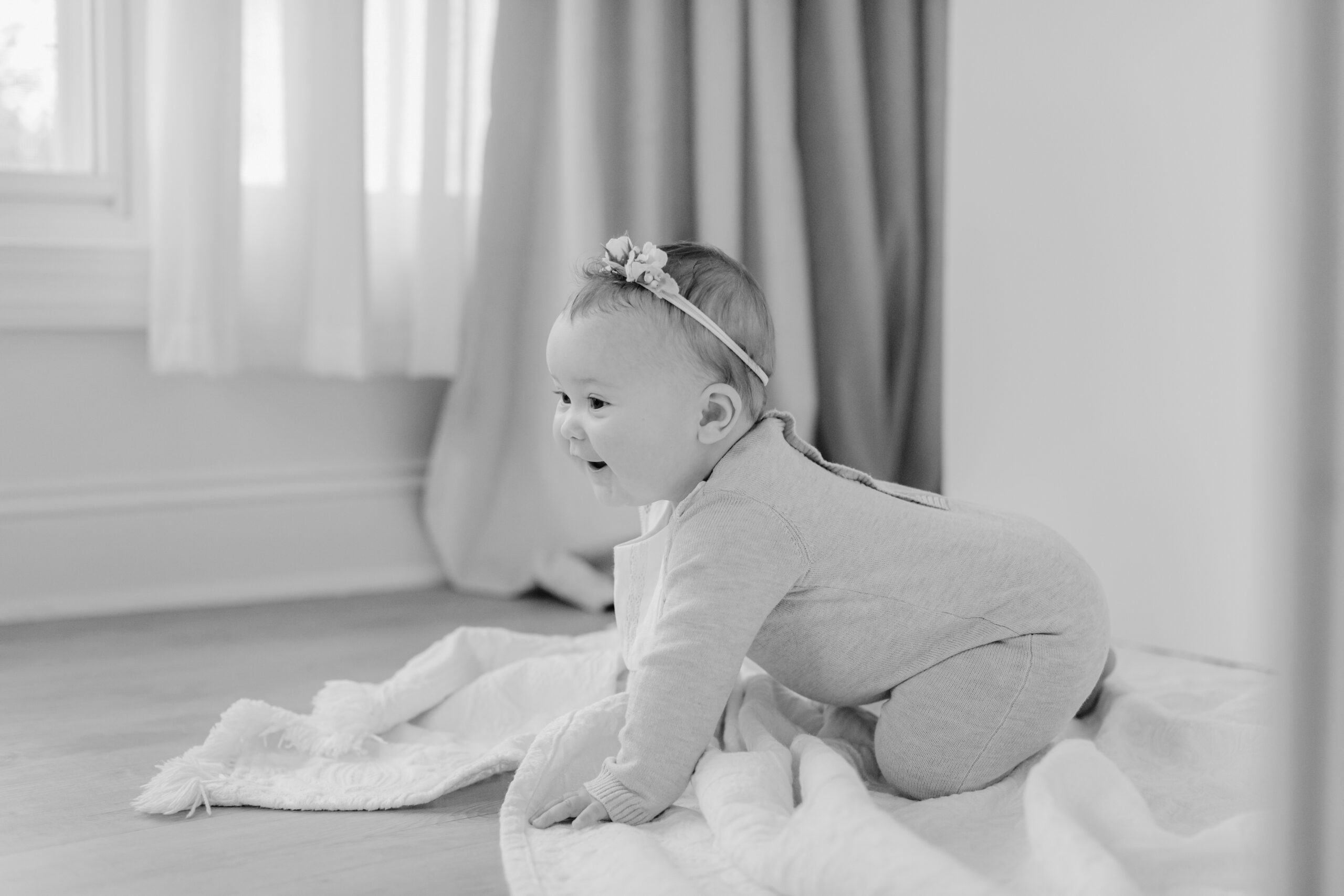 6 month old baby girl crawling