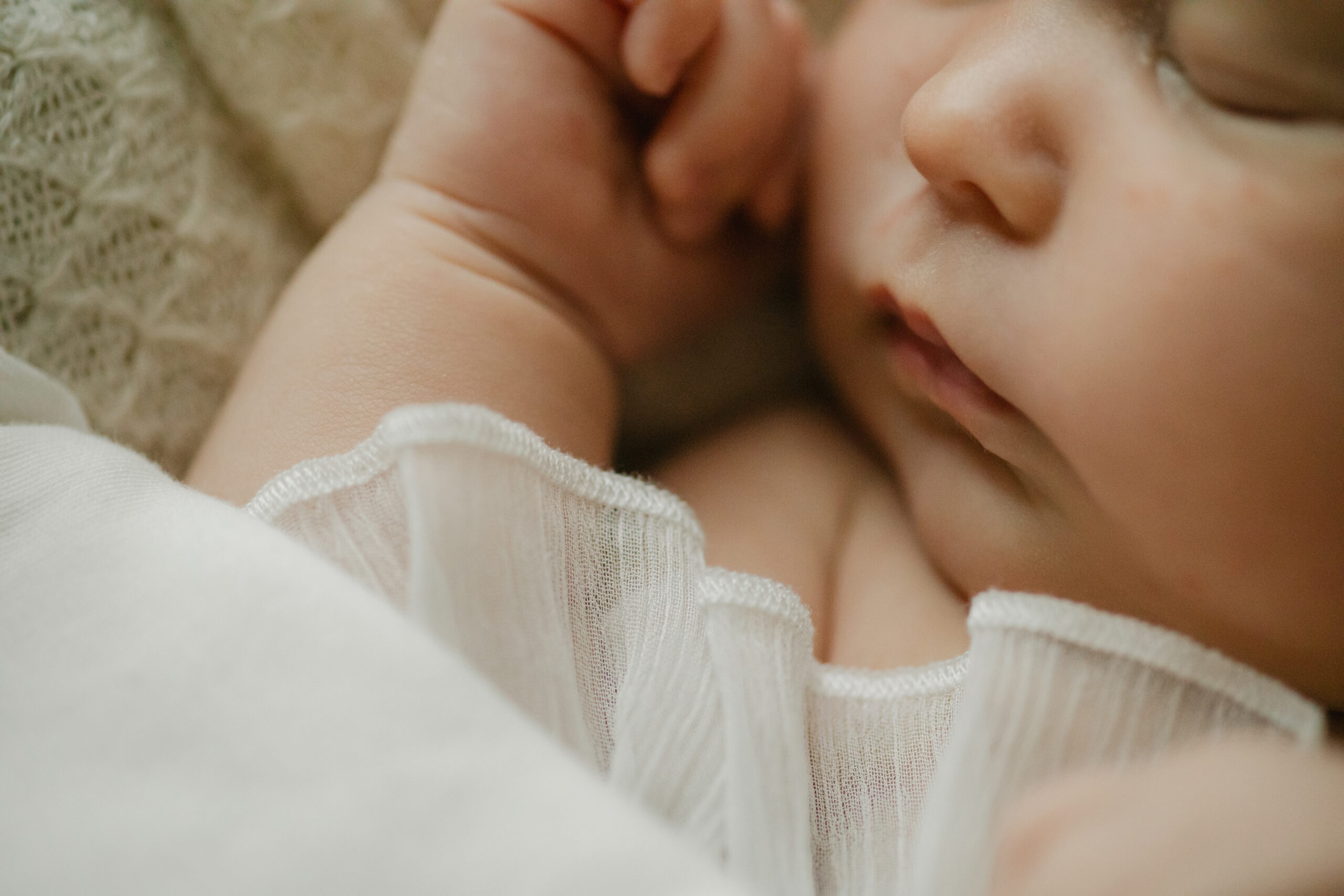 sleepy newborn baby girl