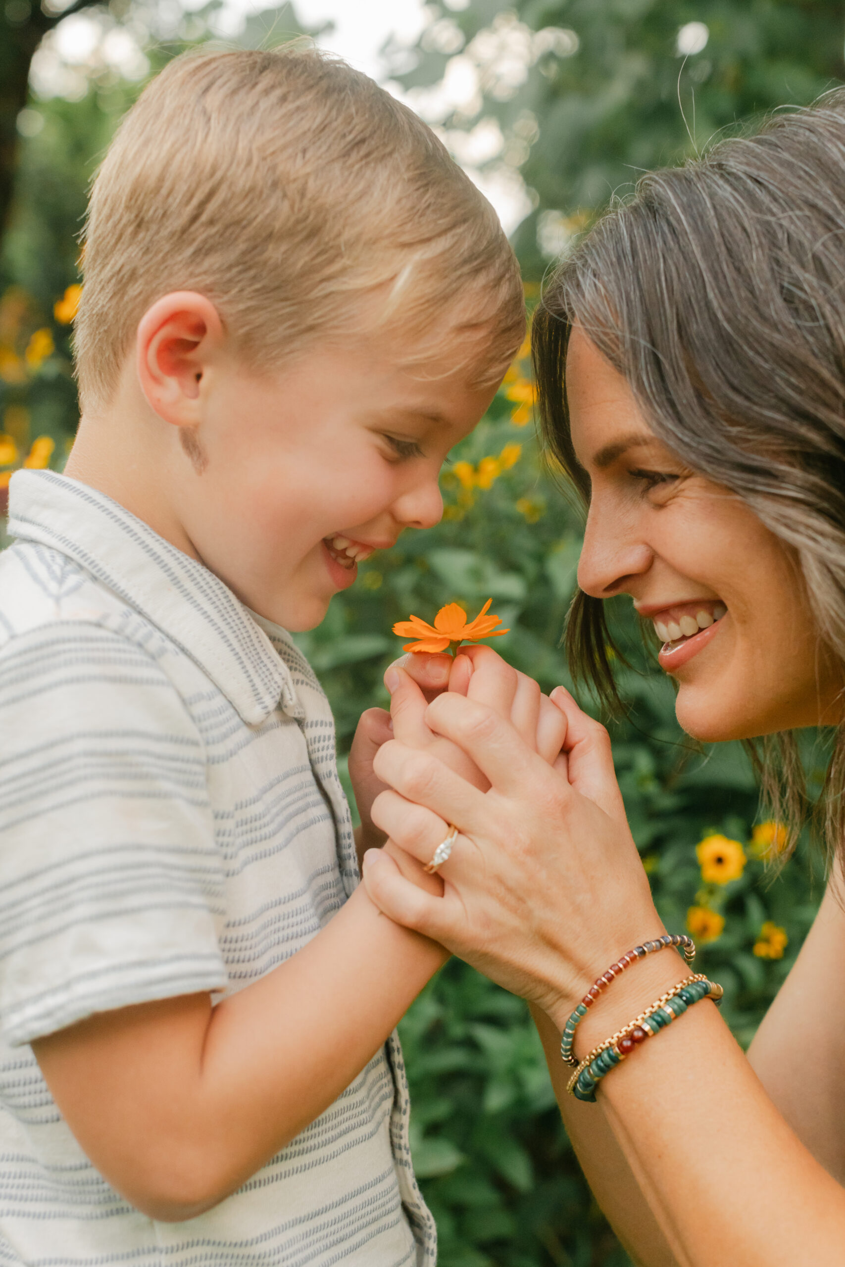 mama and young son in flower garden. motherhood minis photo session in nashville