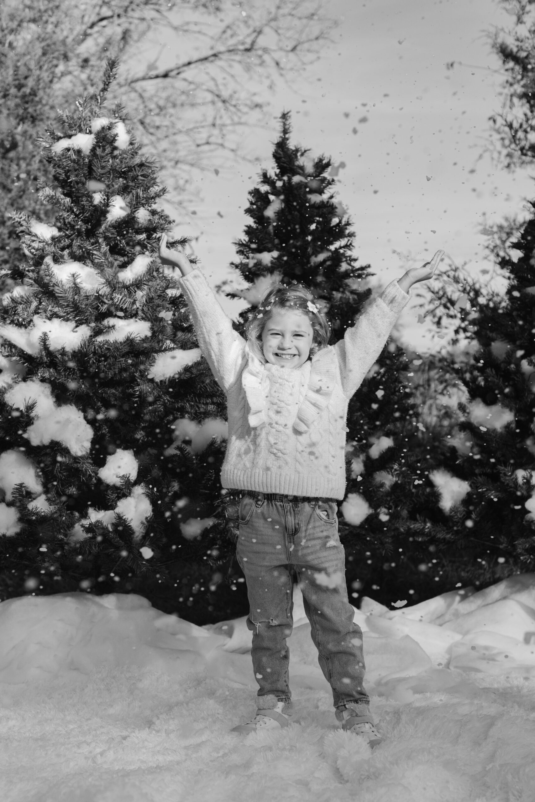 little girl playing with fake snow. snow minis