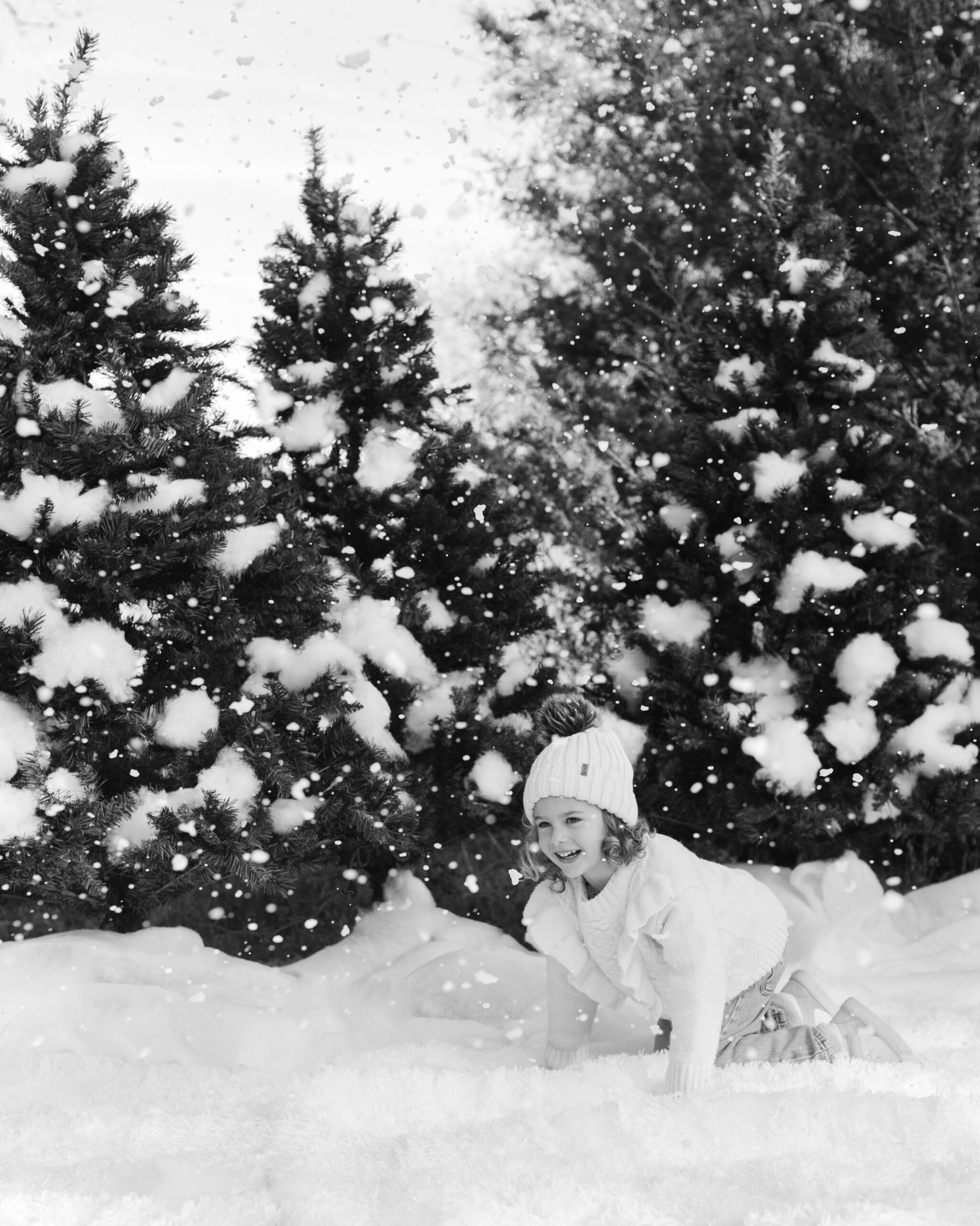 little girl playing with fake snow. snow minis