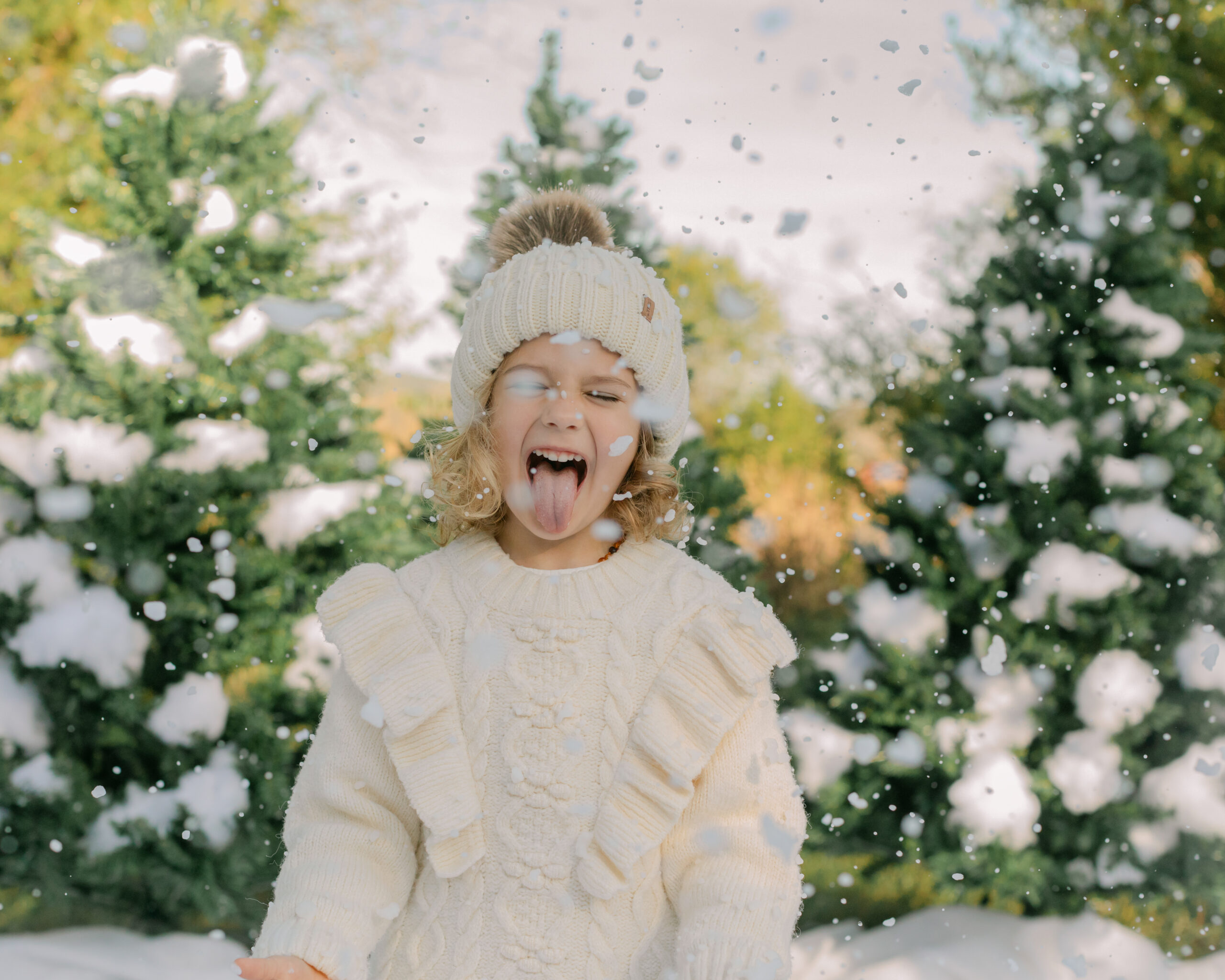 little girl playing with fake snow. snow minis