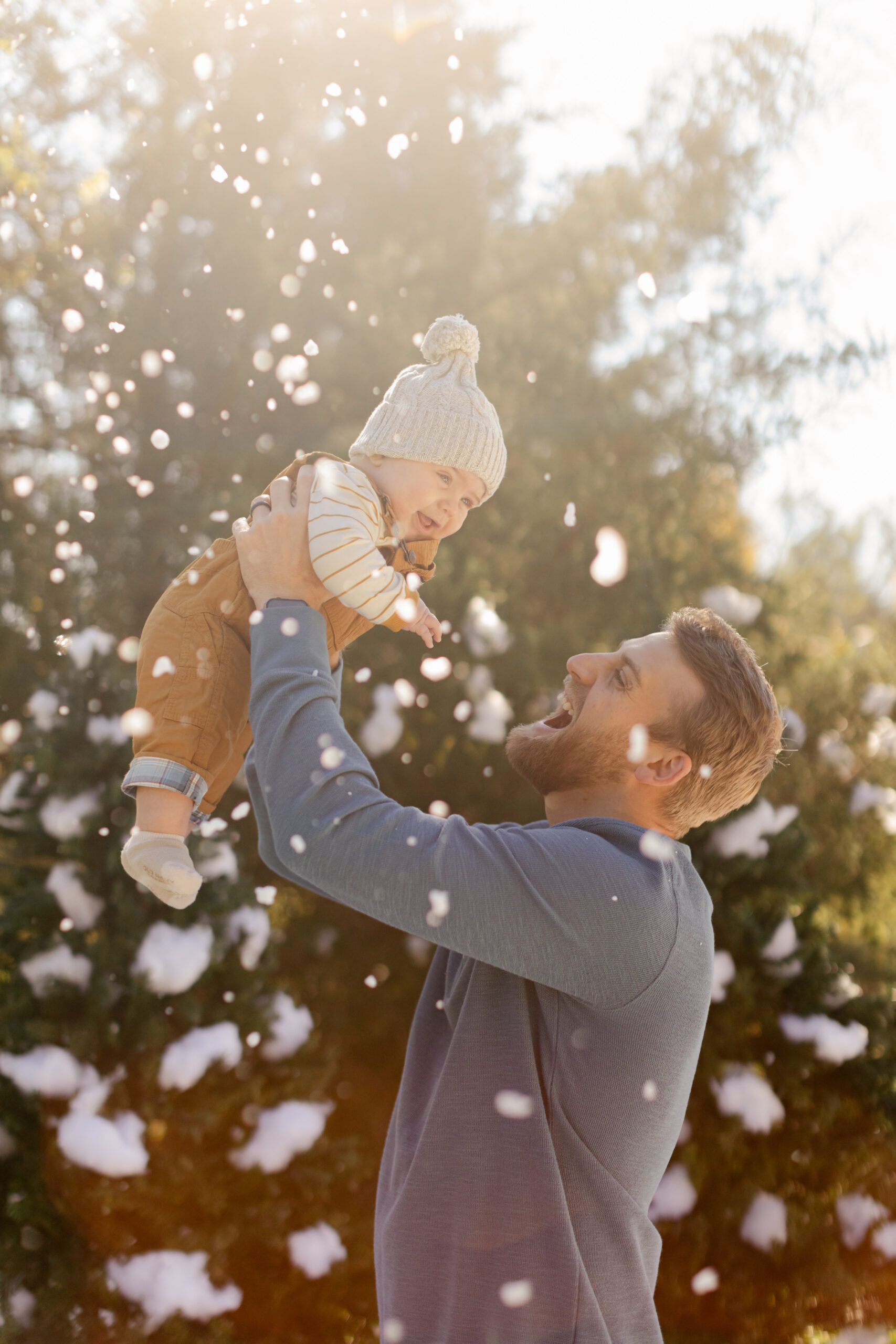 dad and son. snowy christmas family photos