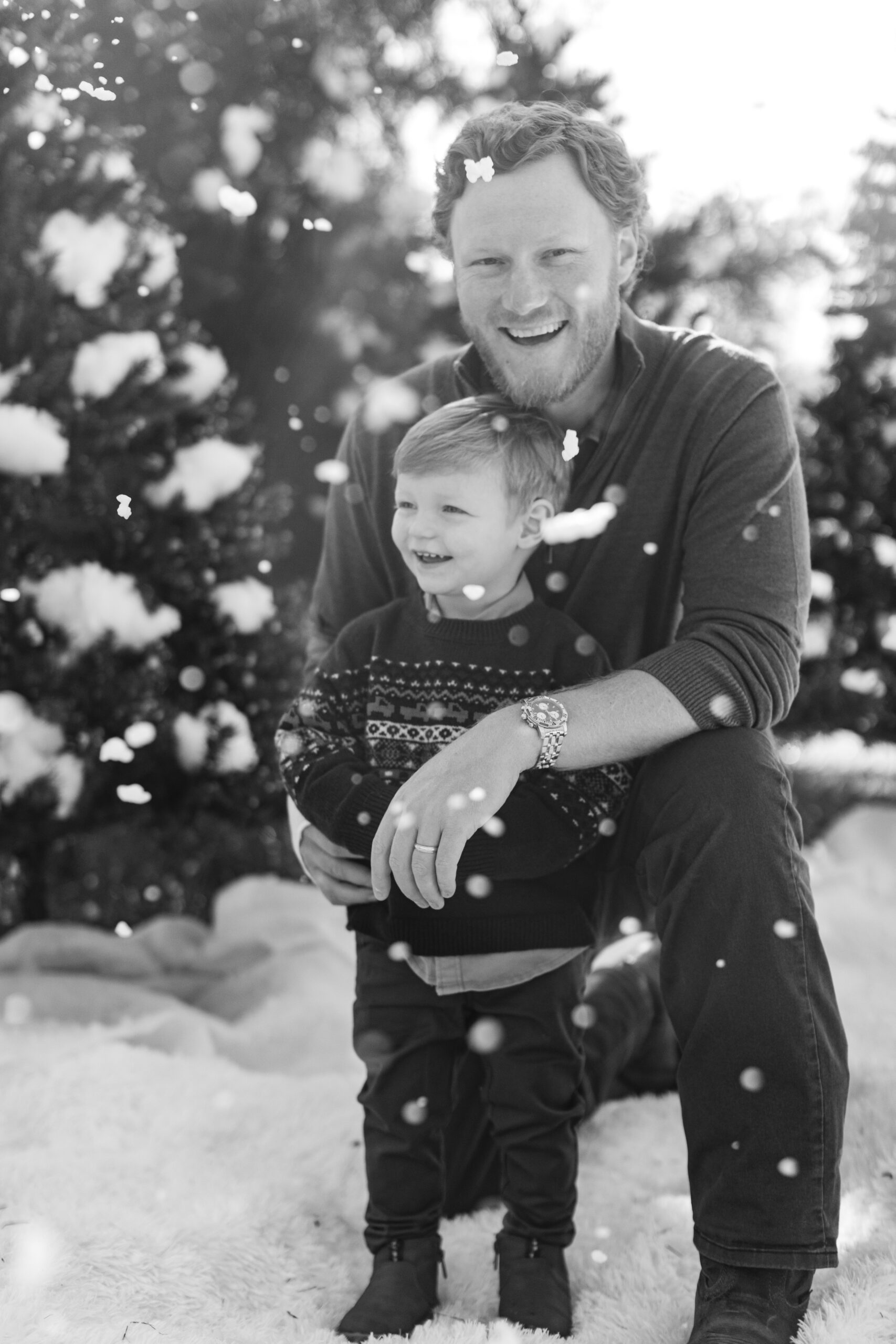 dad and son. snowy christmas family photos