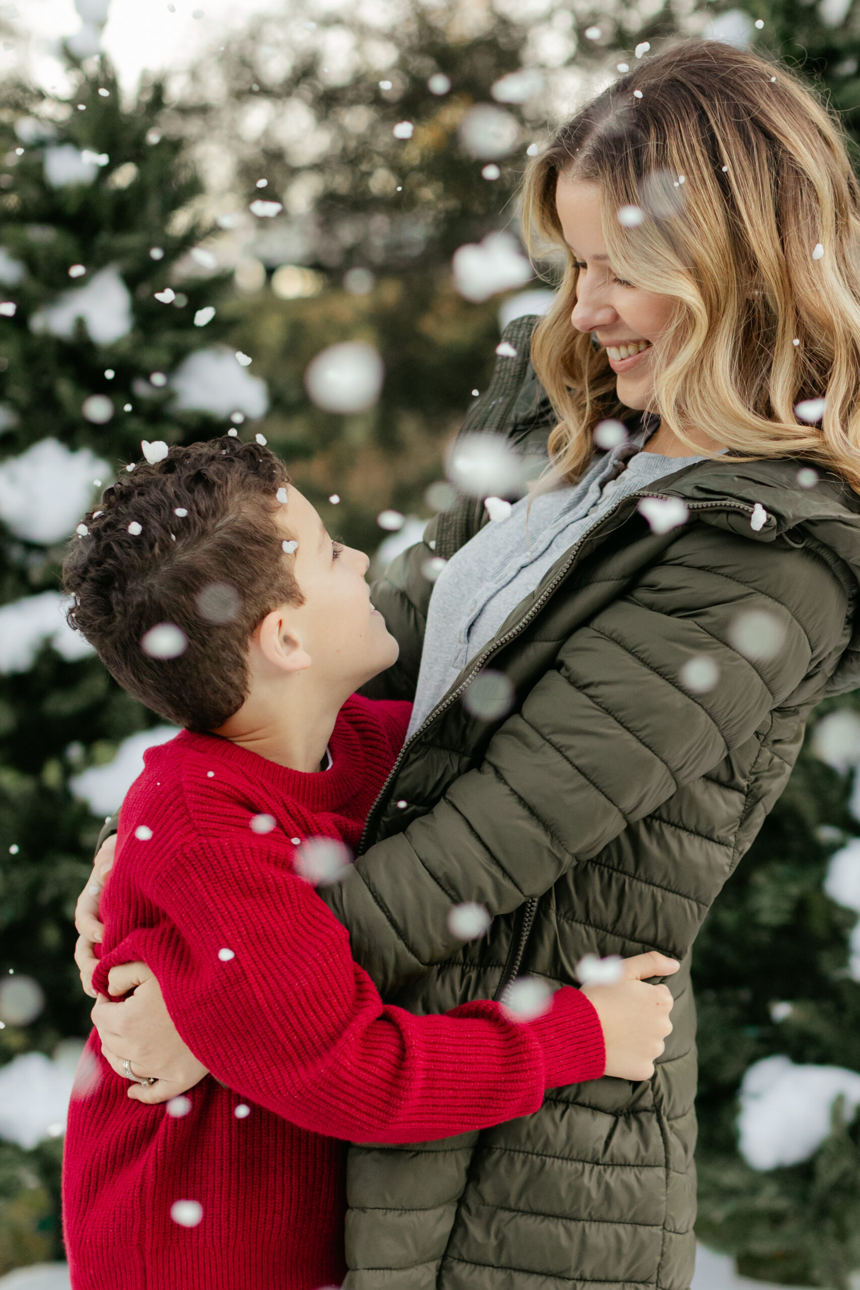 mom and son. snowy christmas family photos