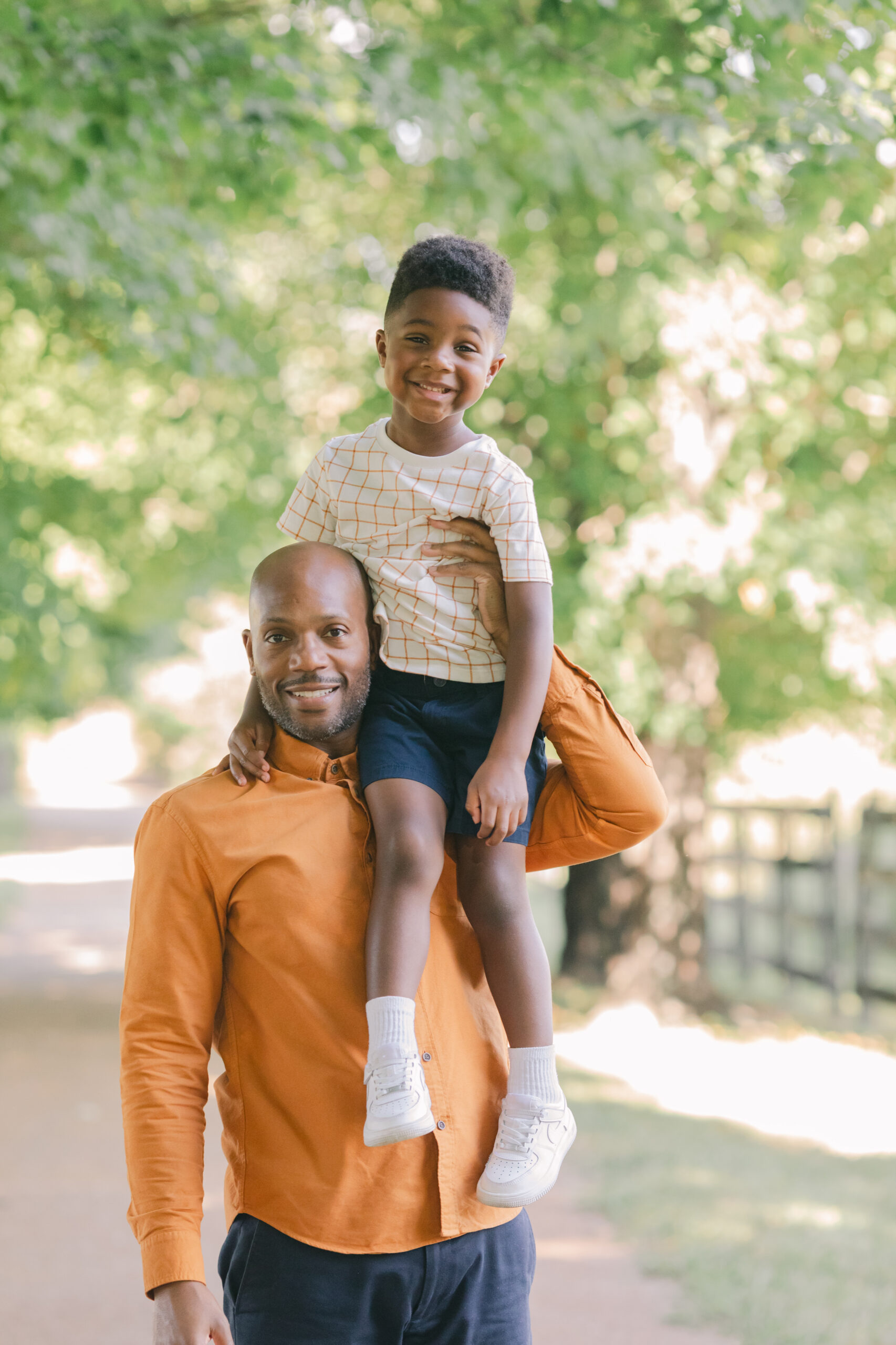 boy on dad's shoulder