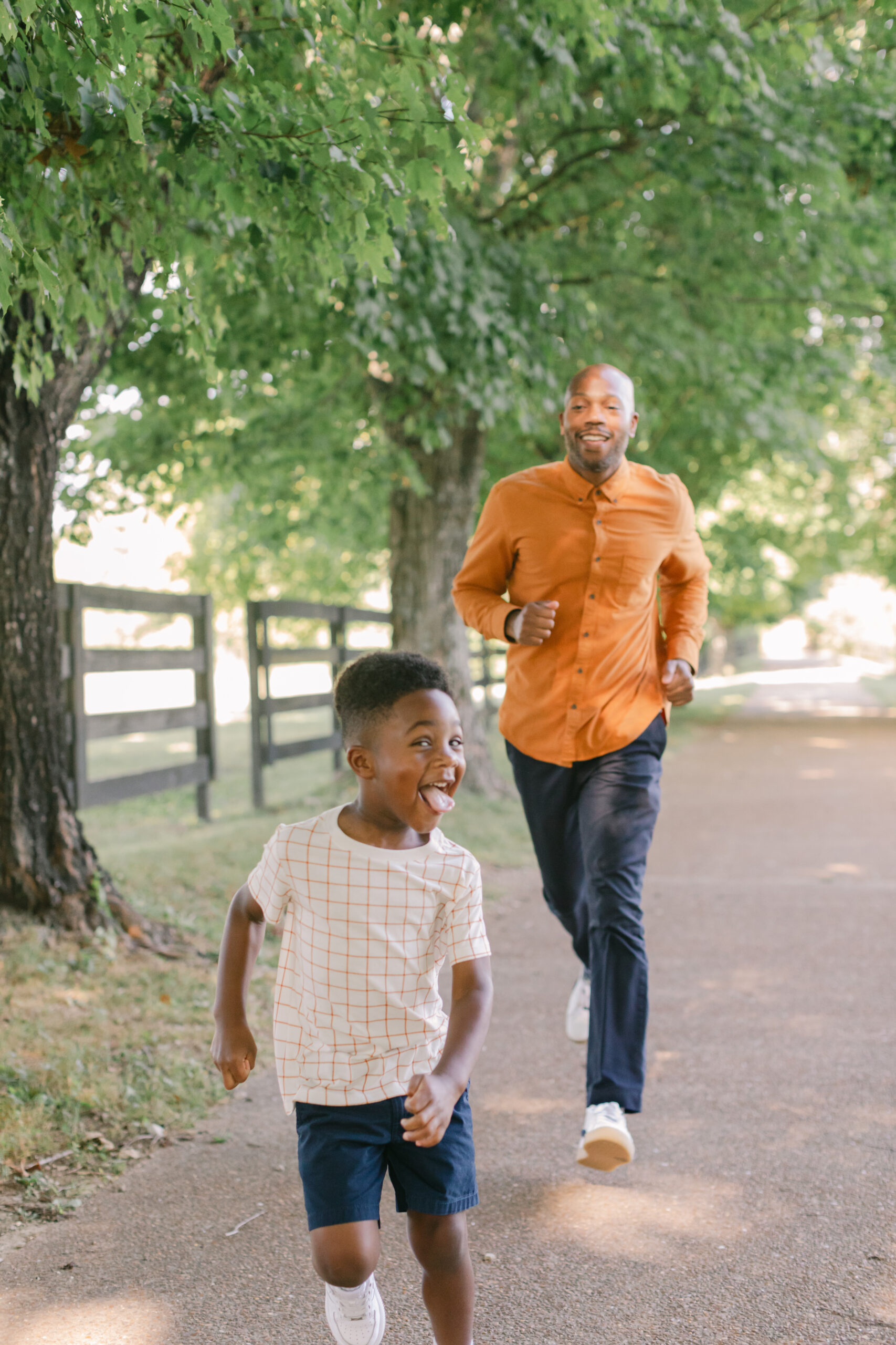 dad chasing young son