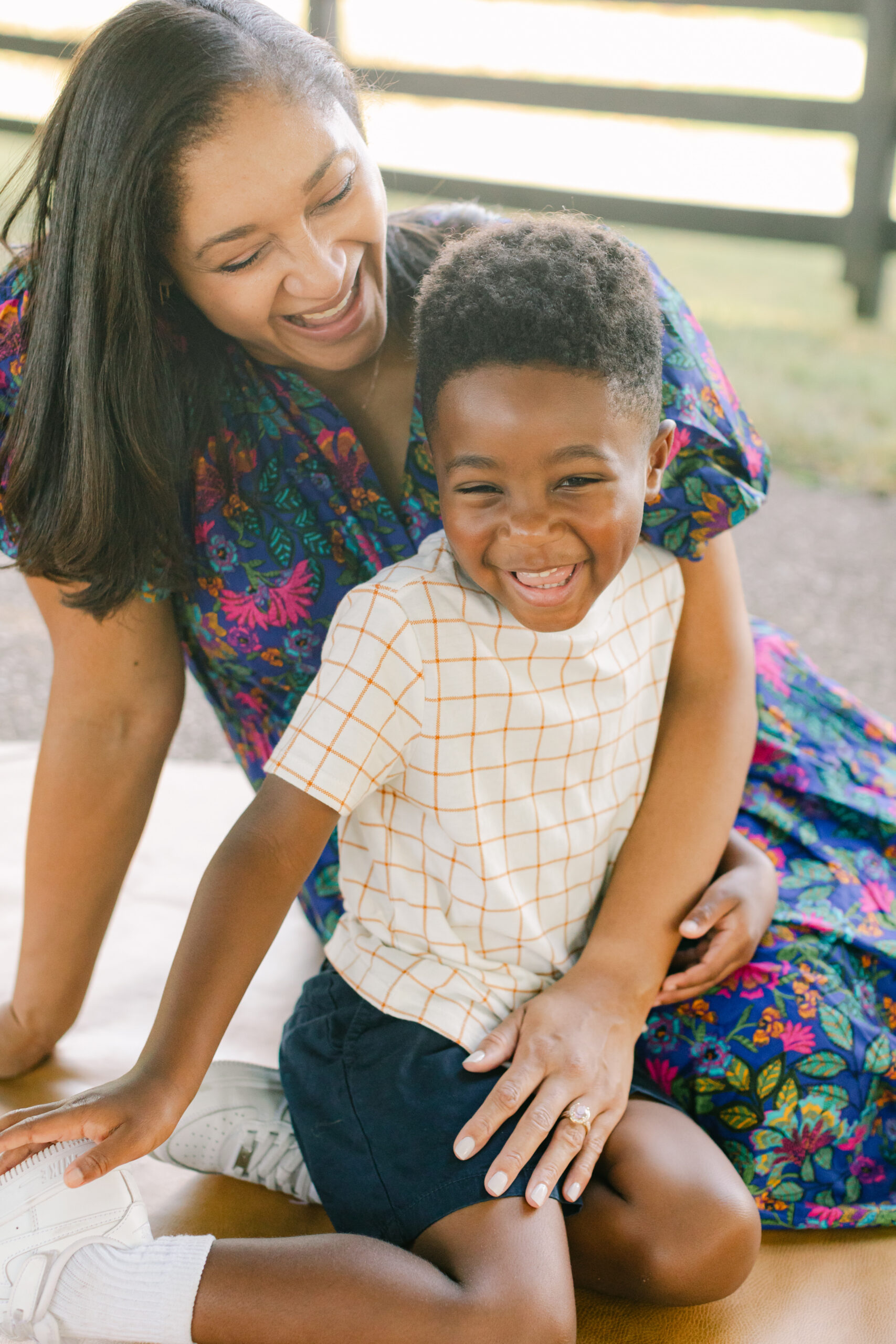 mama and son smiling and laughing