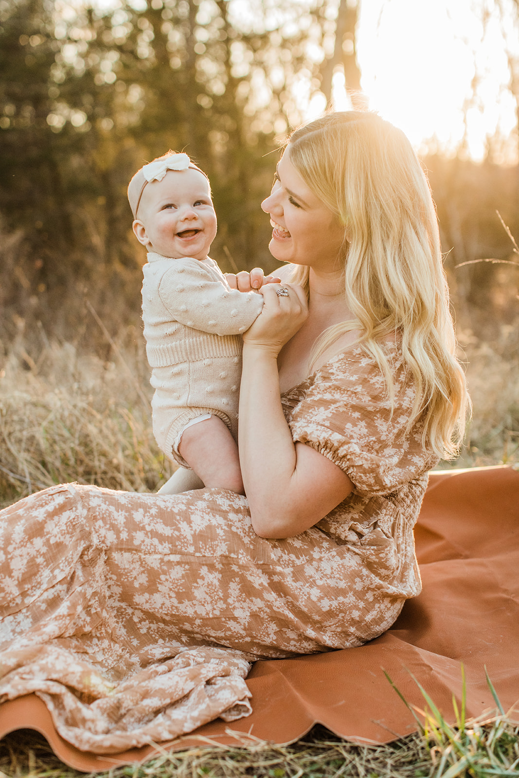 mama and baby girl. outdoor fall family session in grassy field