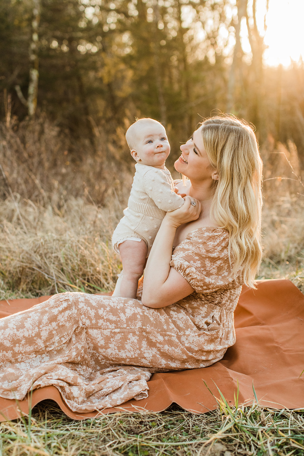 mama and baby girl. outdoor fall family session in grassy field