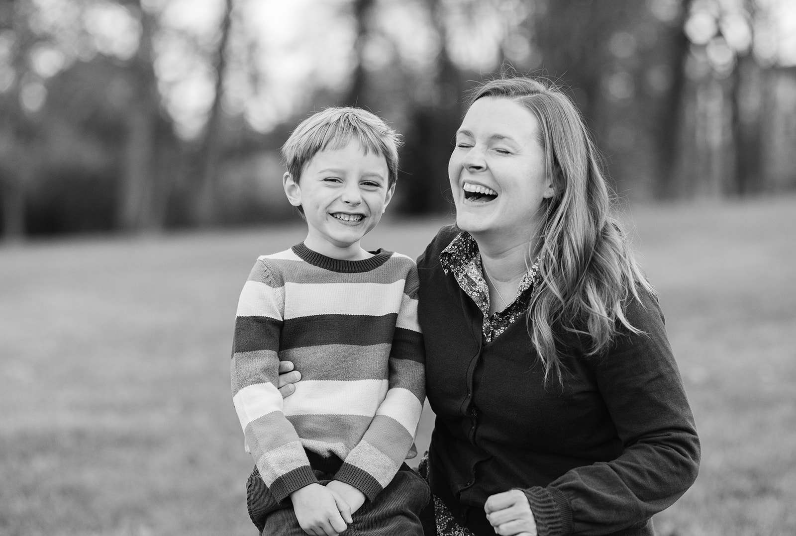 mom and son laughing.