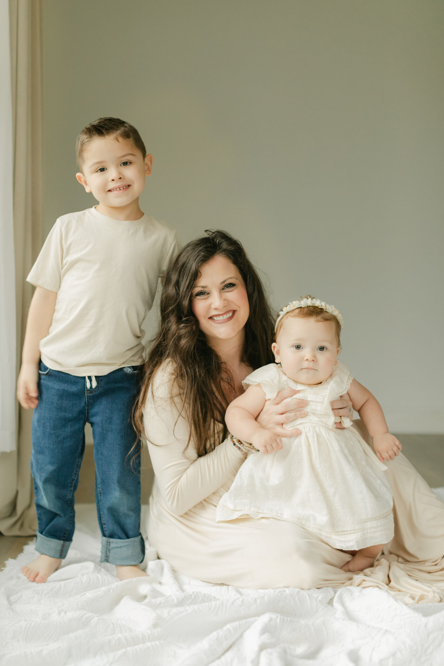 Mama with her two kids. 1 year baby milestone session