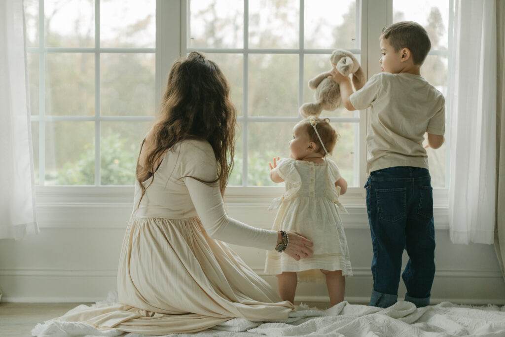 Mama with her two kids. 1 year baby milestone session