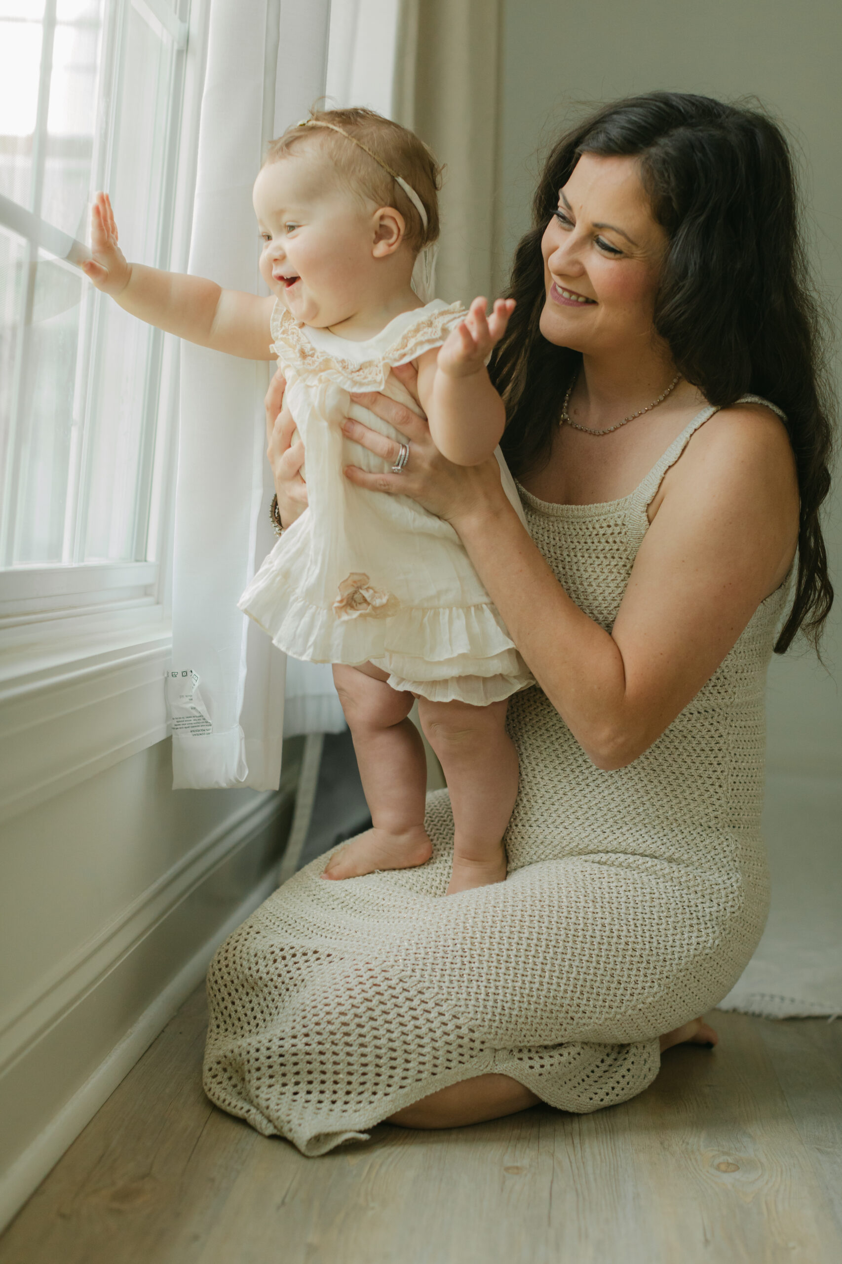 mama and baby girl. 10 month old baby milestone session