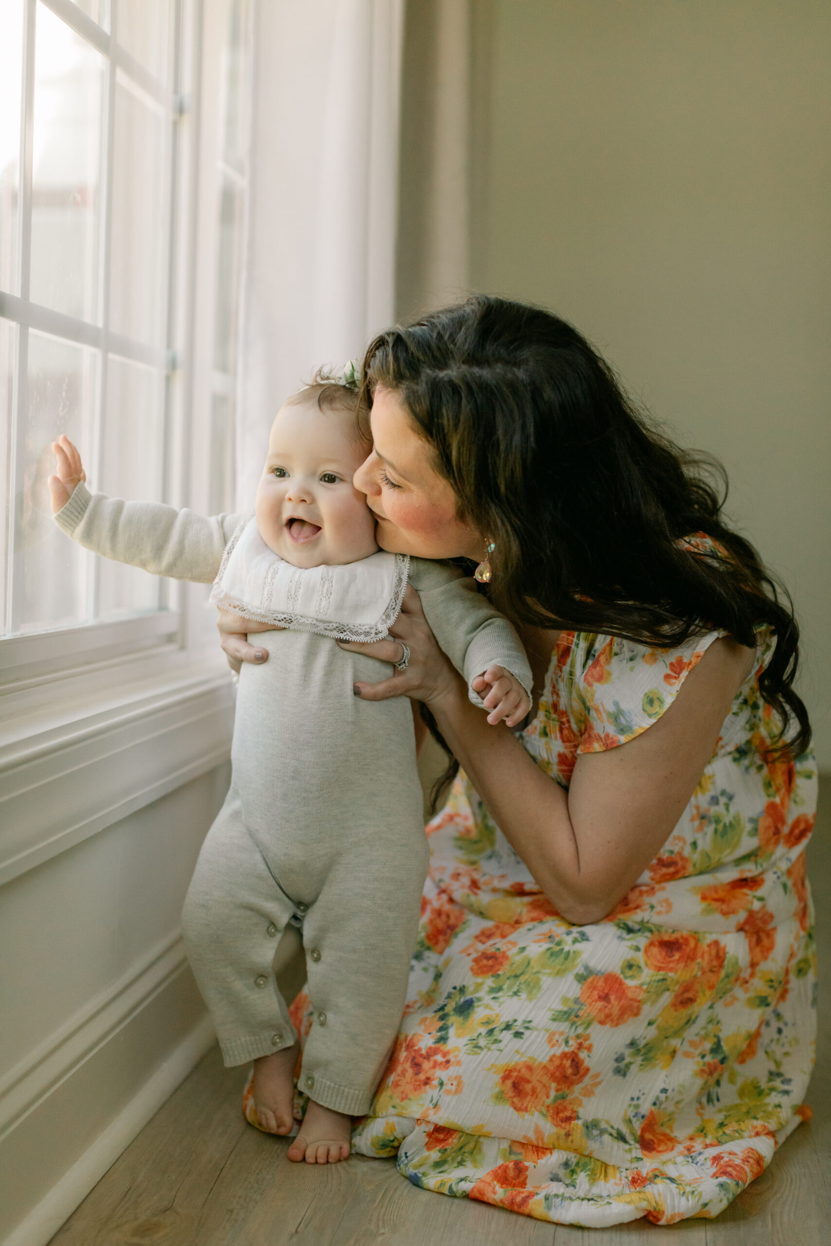 Mama and baby girl. 6 month old baby milestone session