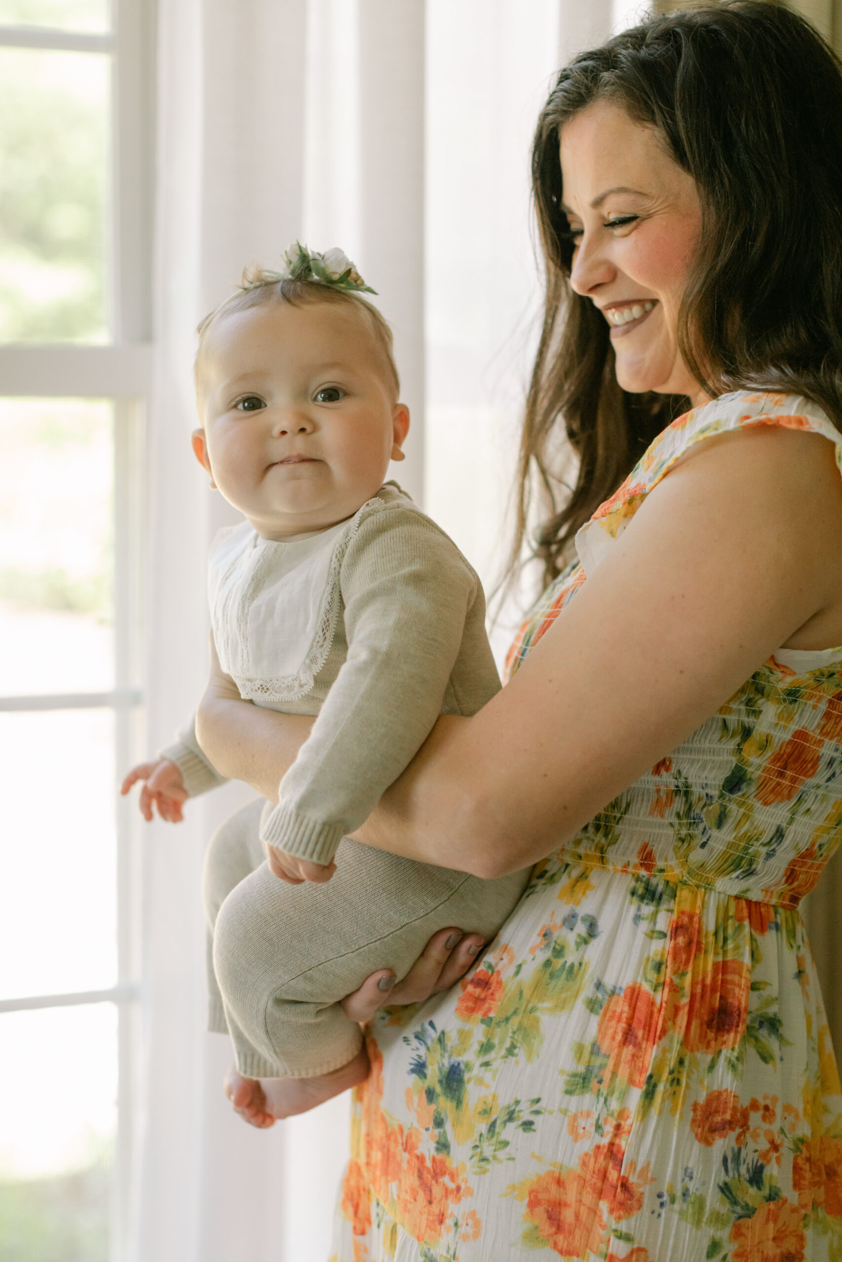 Mama and baby girl. 6 month old baby milestone session