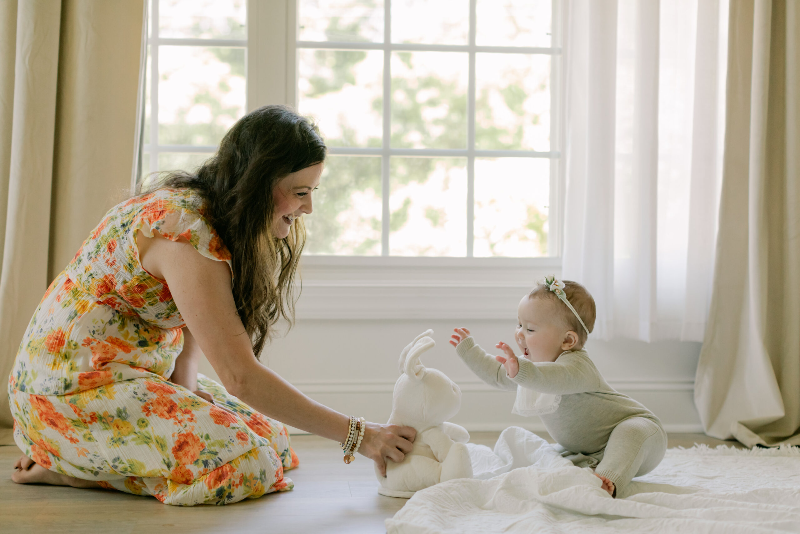 Mama and baby girl. 6 month old baby milestone session