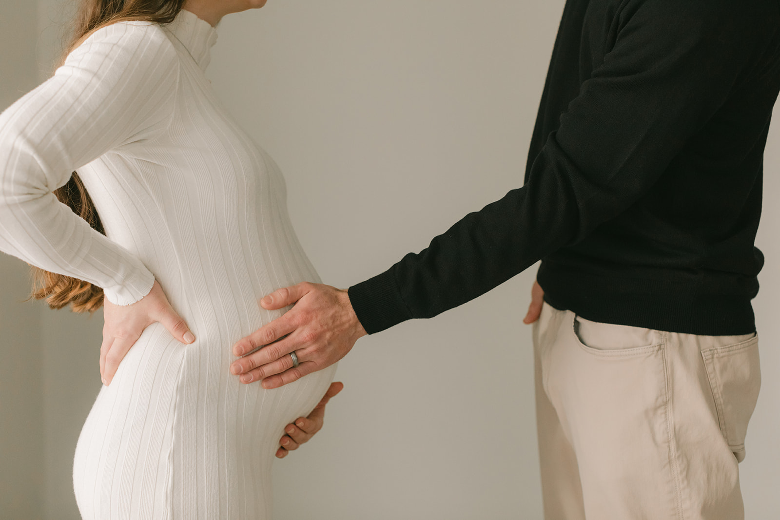 couple posing during studio maternity session