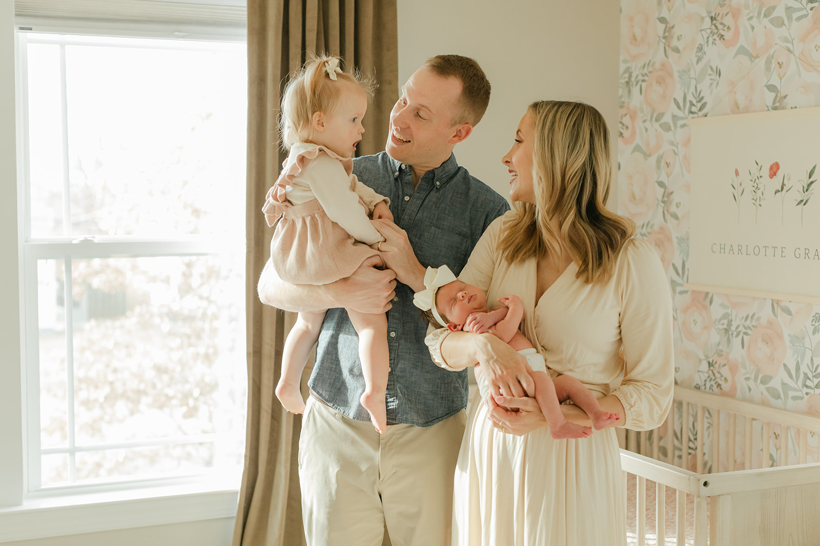 family photo during newborn session in nursery