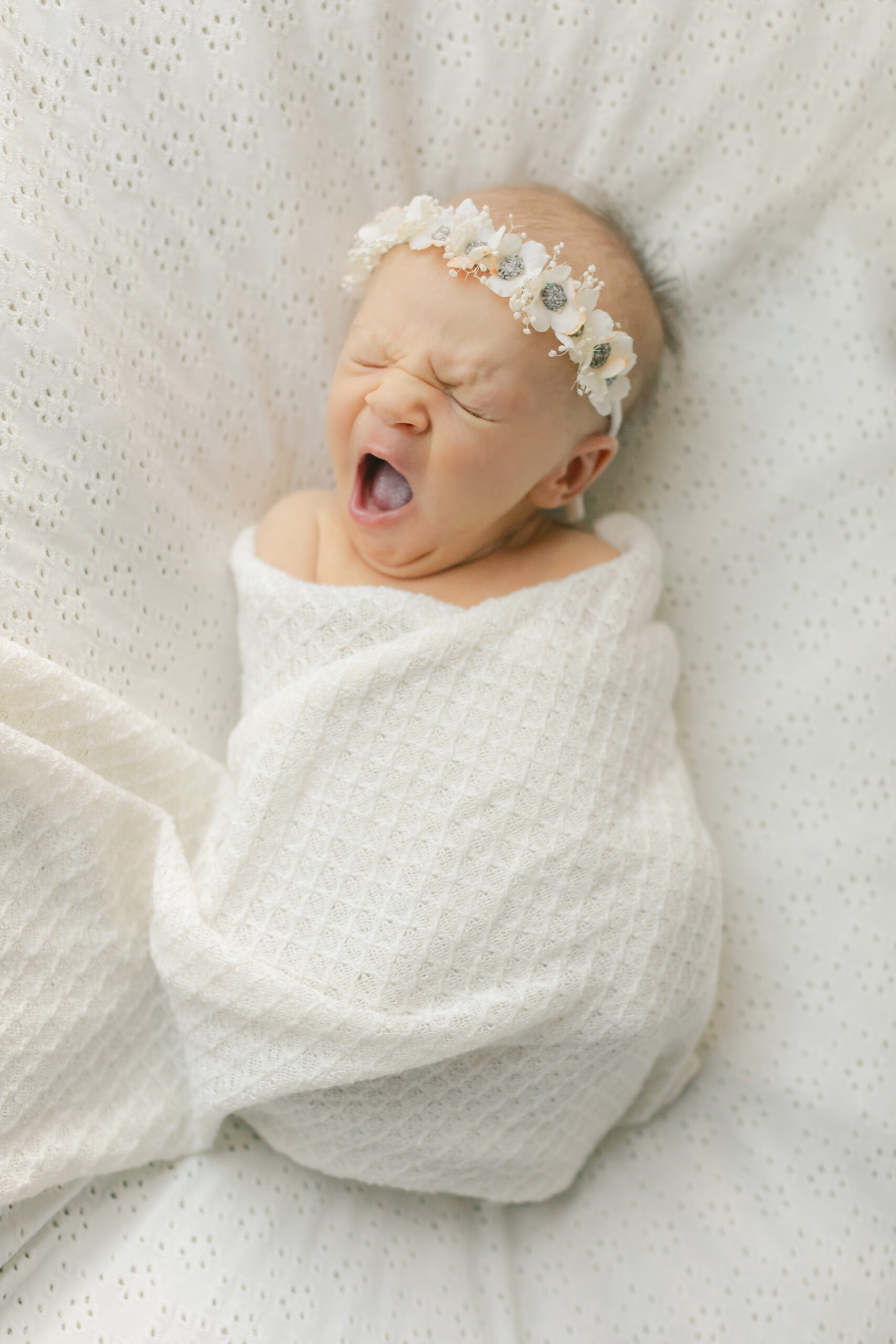 sleepy newborn baby girl 