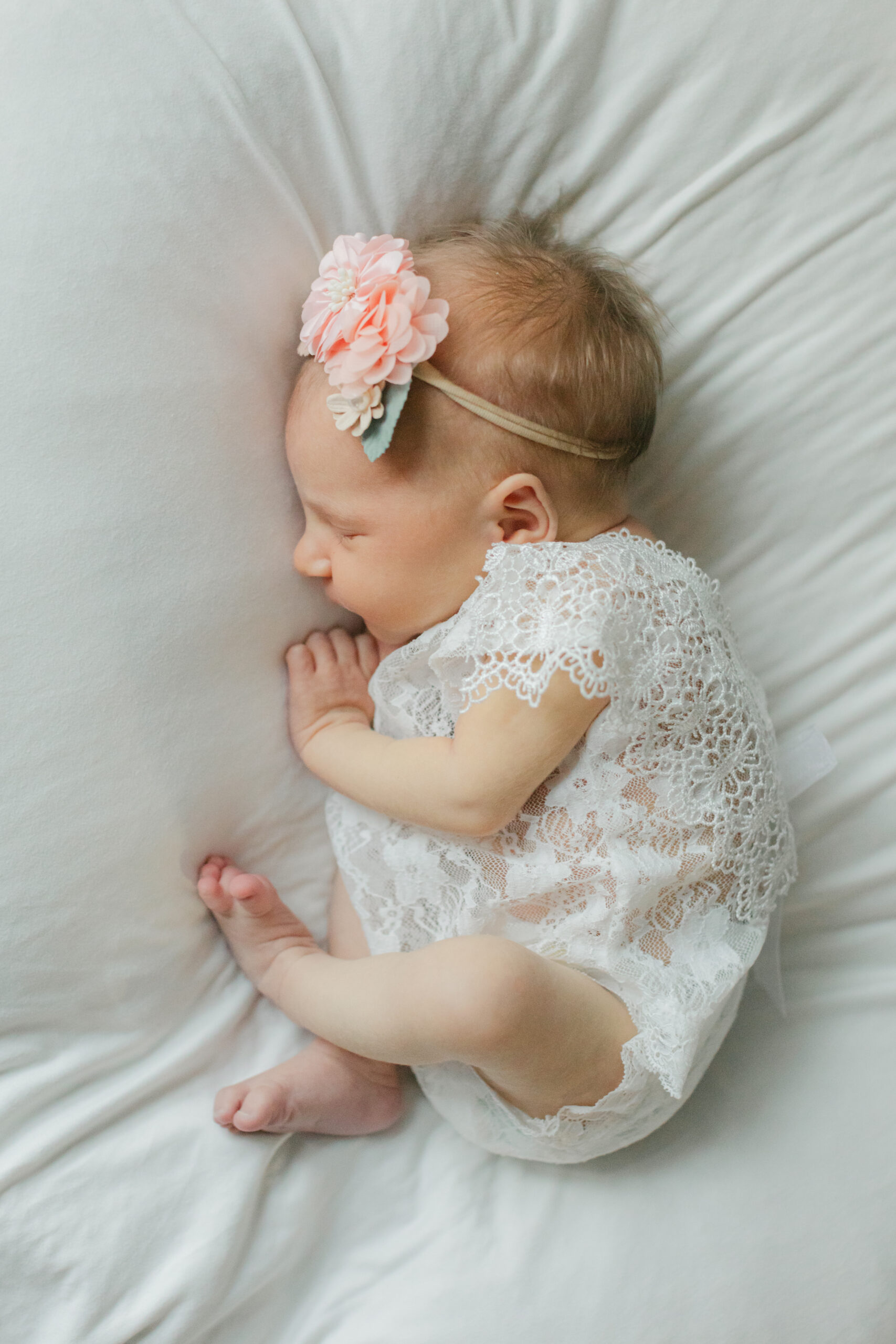 sleepy newborn baby girl 