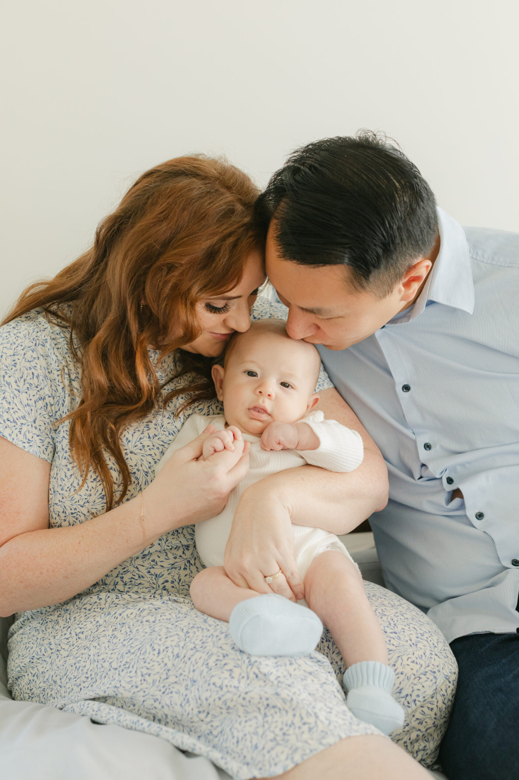 parents in nursery with newborn son