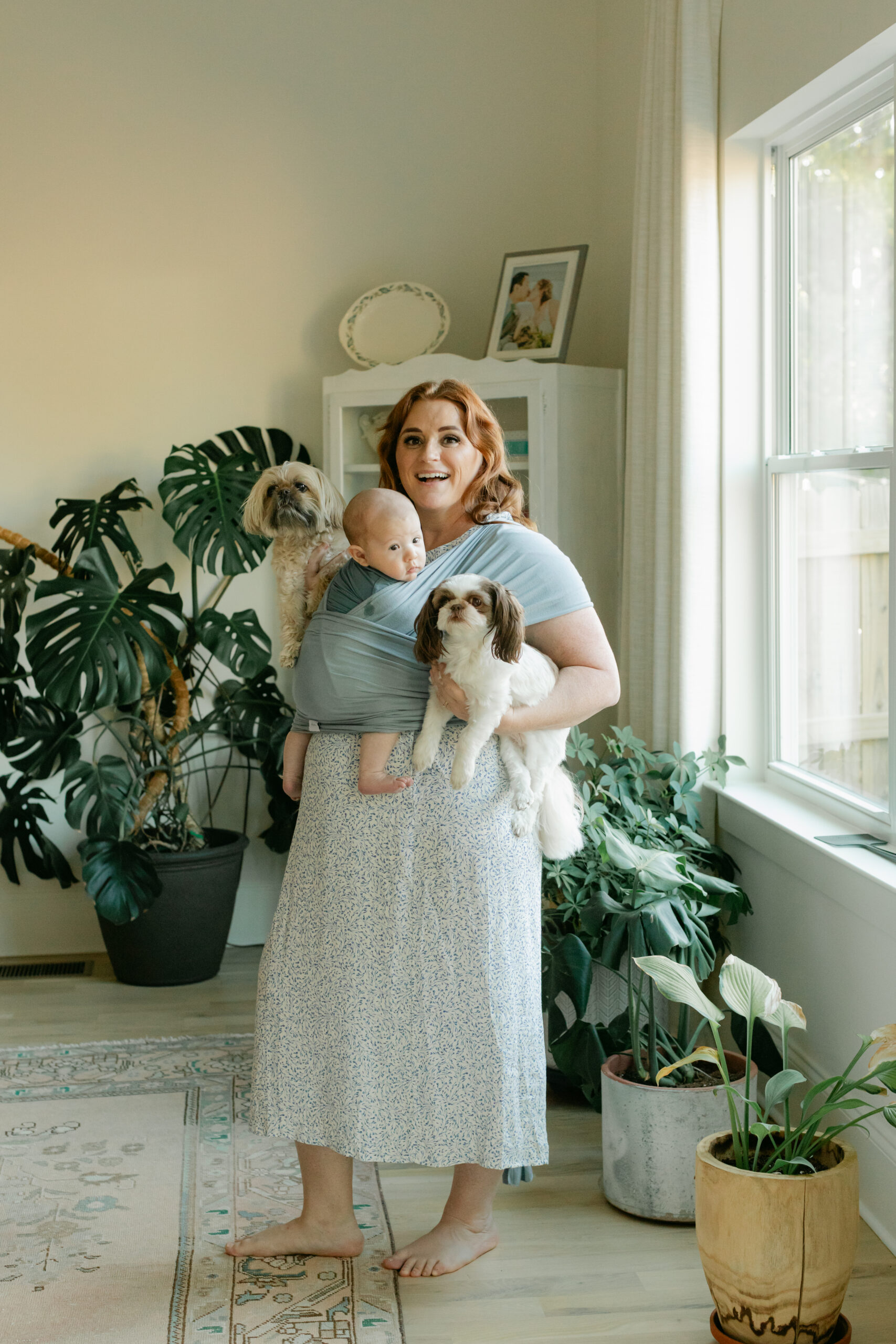 mama with baby boy and 2 family dogs