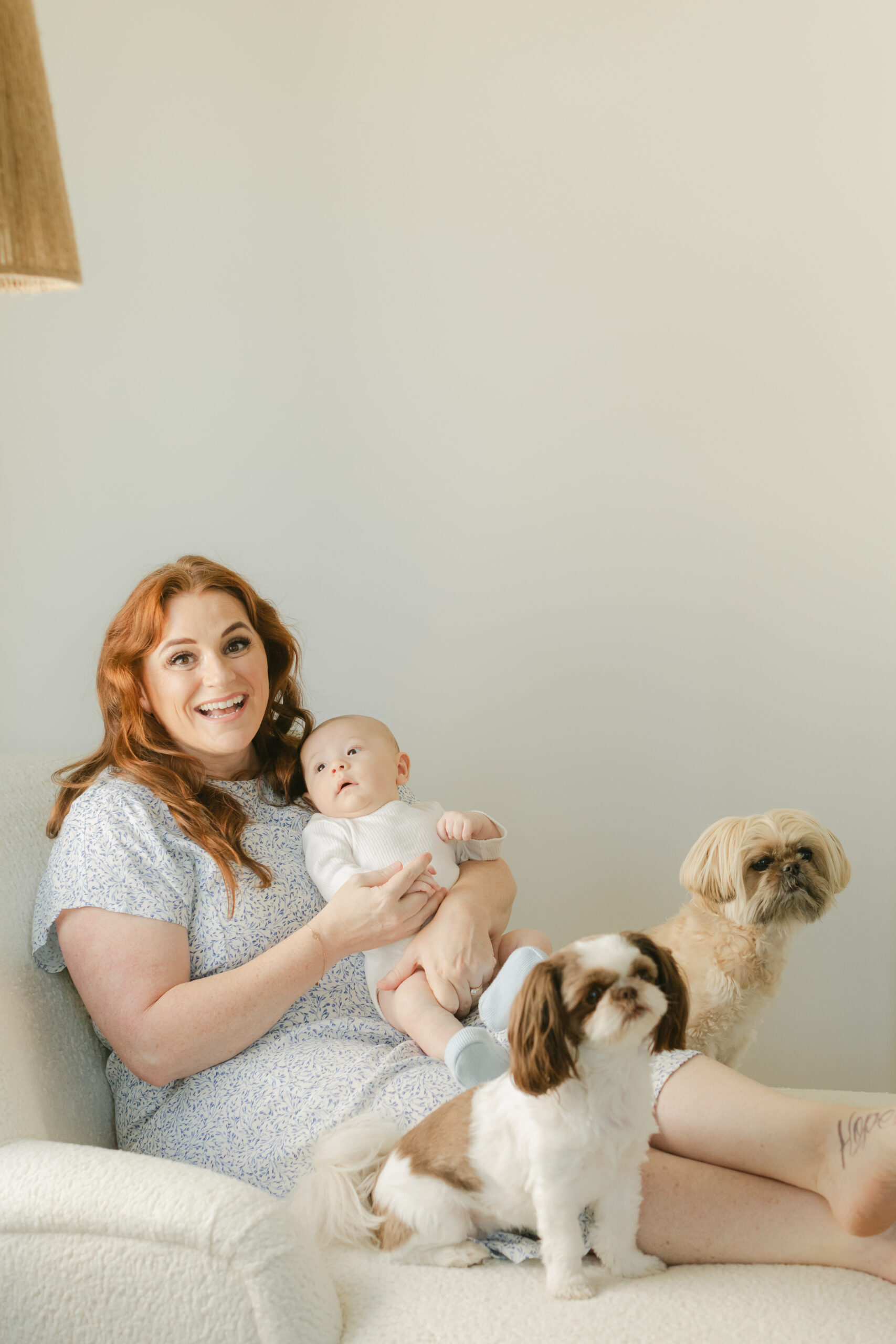 mama with baby boy and 2 family dogs