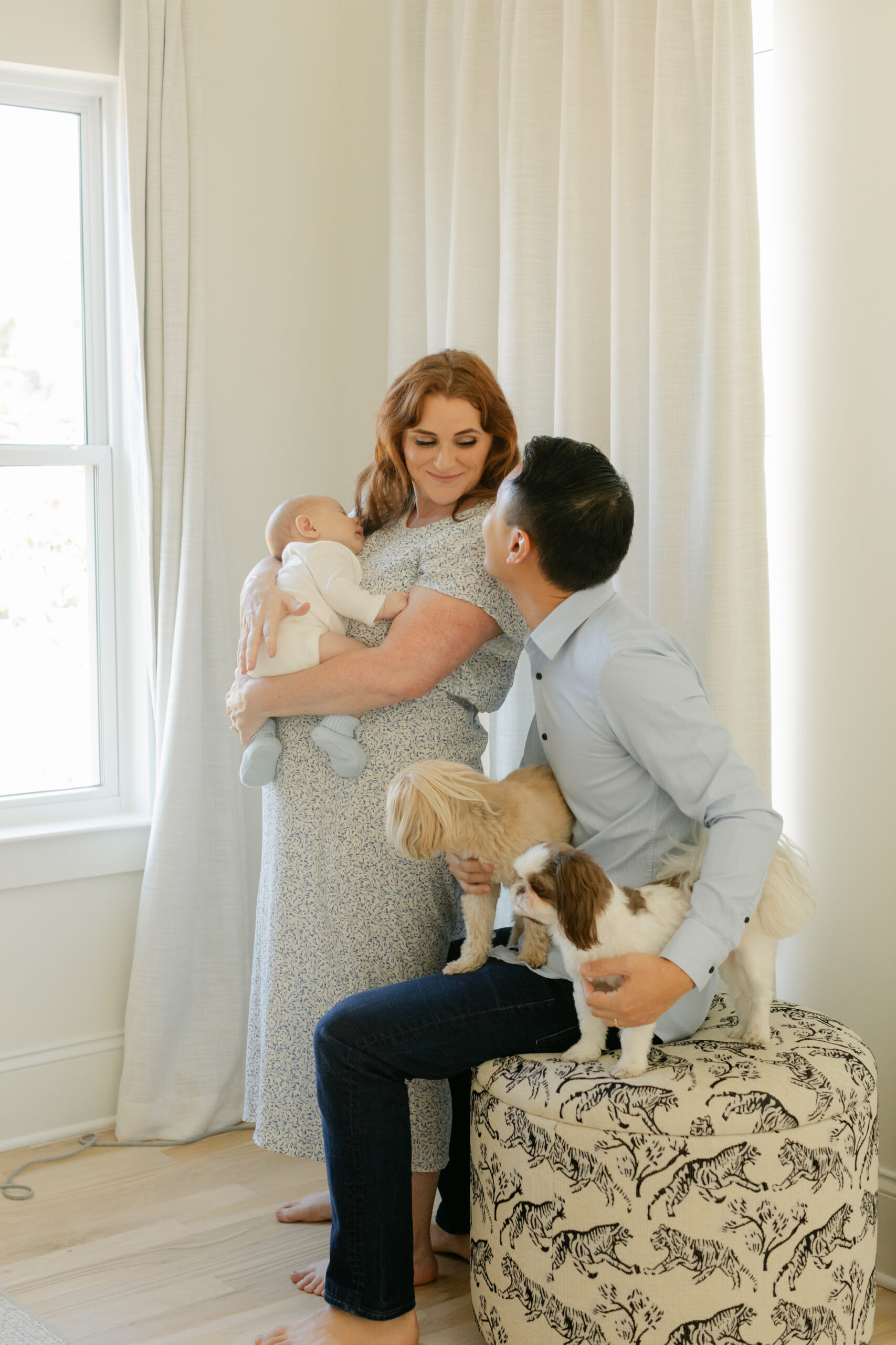 parents in nursery with newborn son