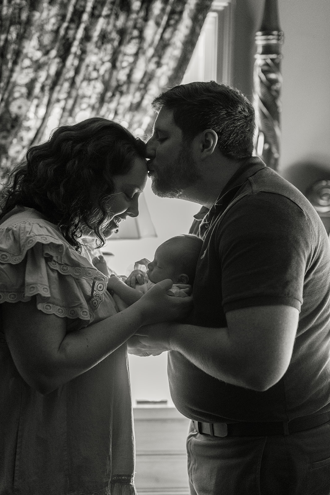 parents with newborn baby boy (in-home session)