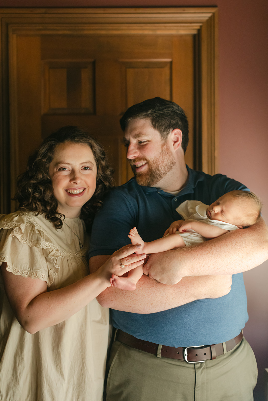 parents with newborn baby boy (in-home session)