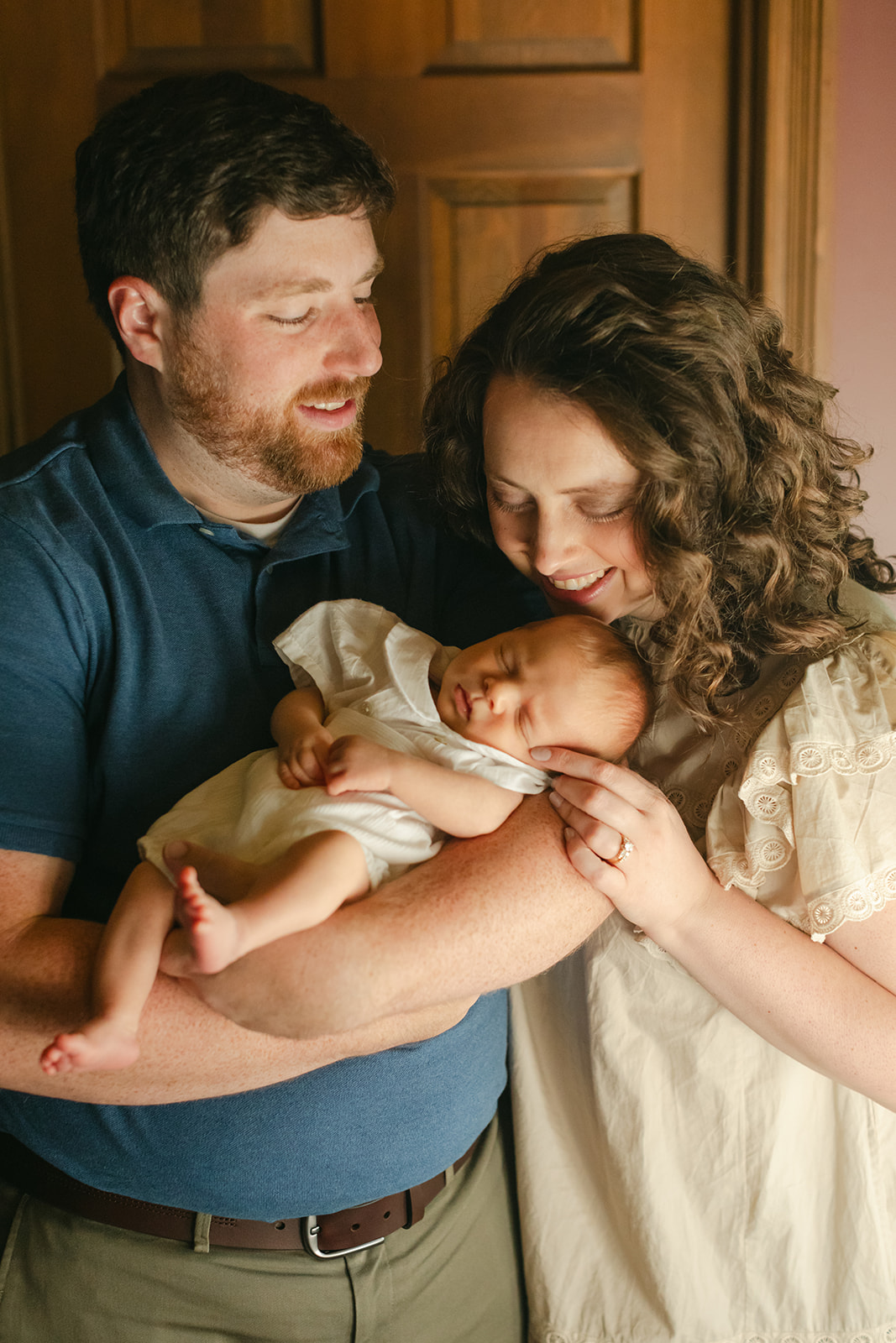 parents with newborn baby boy (in-home session)