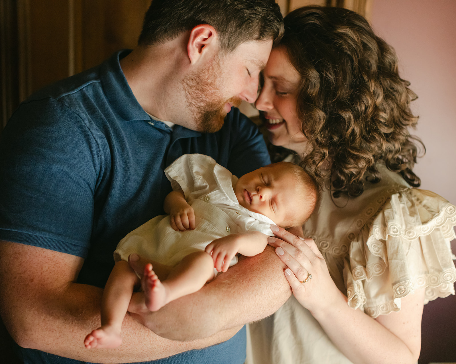 parents with newborn baby boy (in-home session)