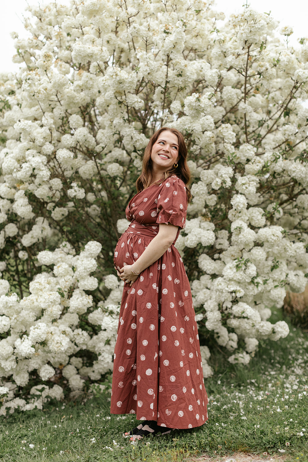maternity session and flower bush