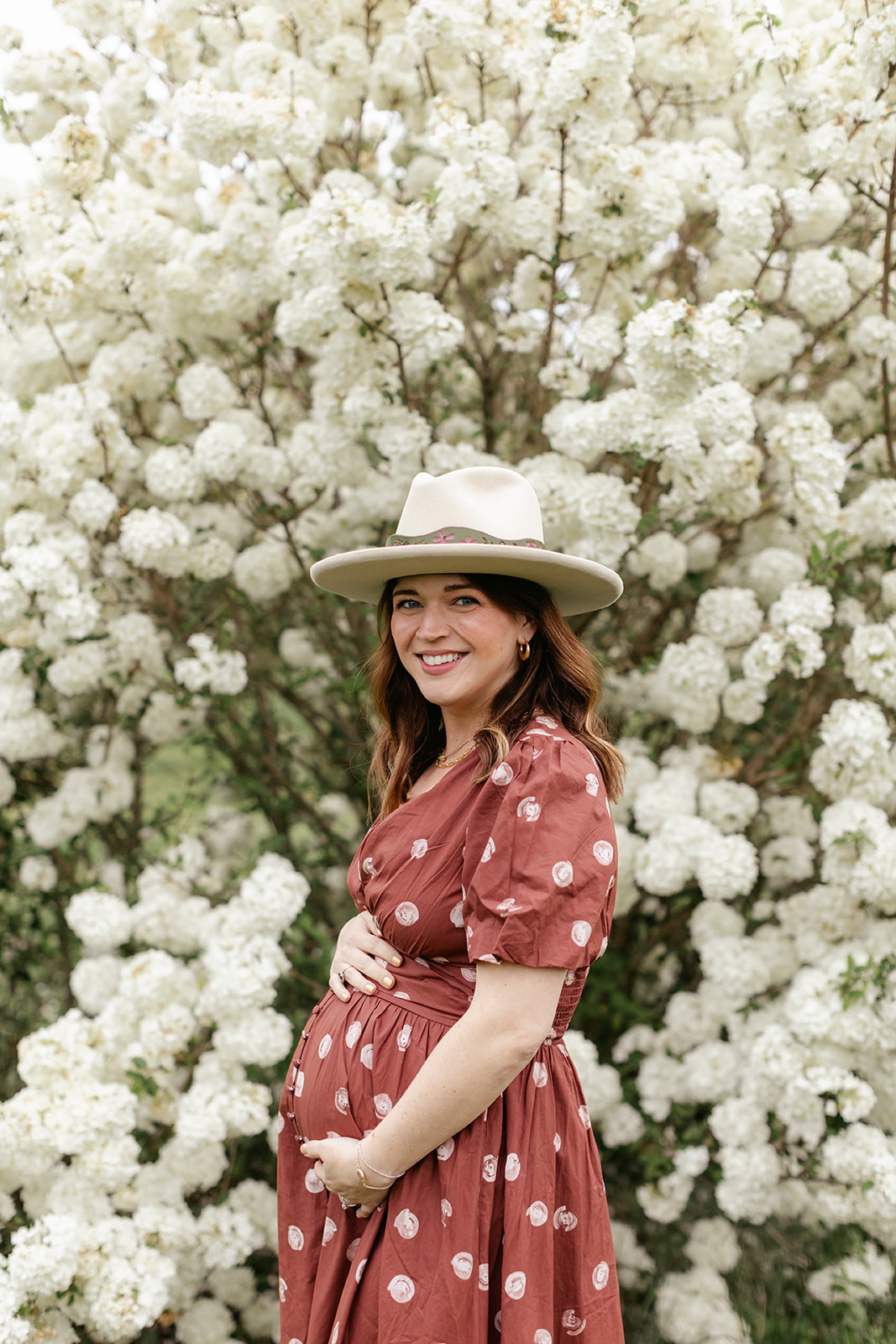 maternity session and flower bush