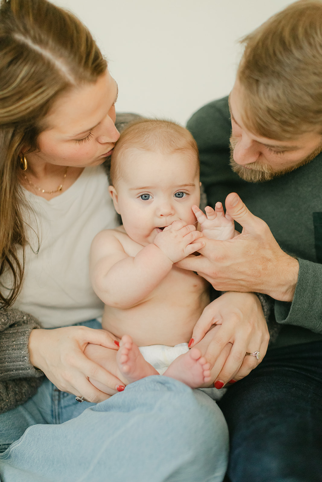 dad, mom and 6 month old son