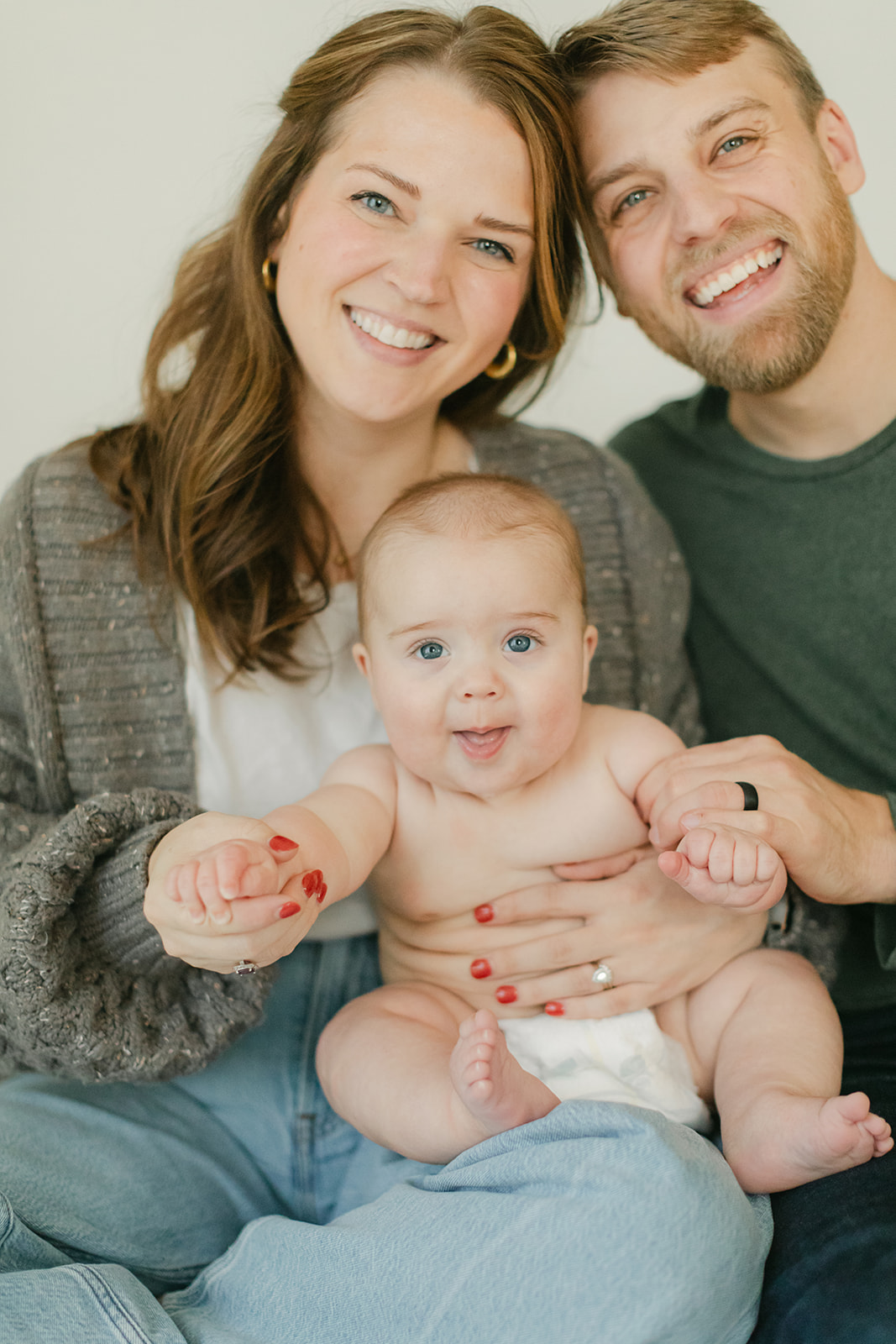 dad, mom and 6 month old son