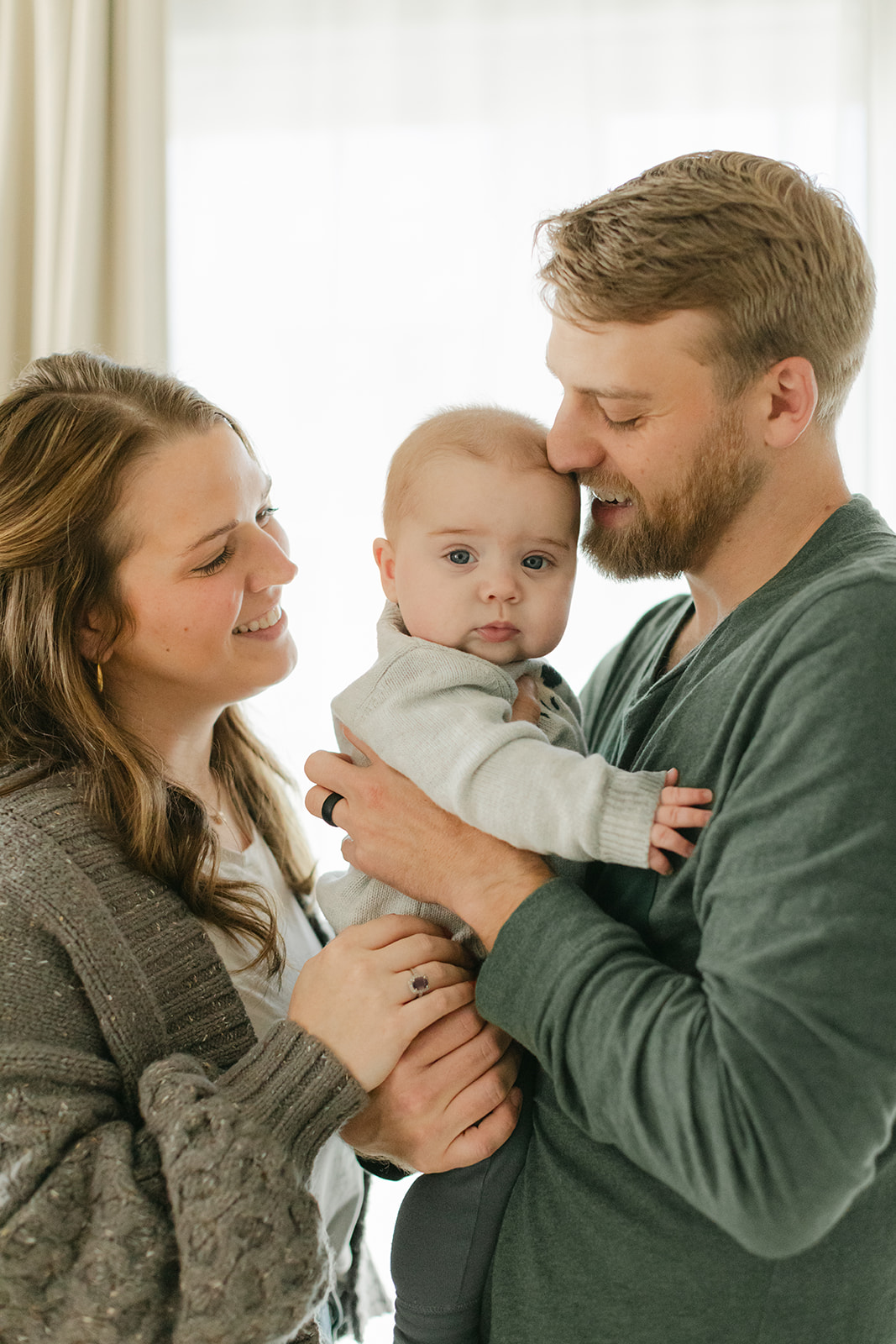 dad, mom and 6 month old son