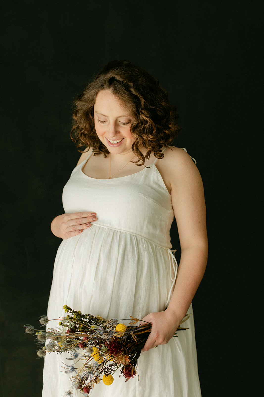 moody maternity session in studio