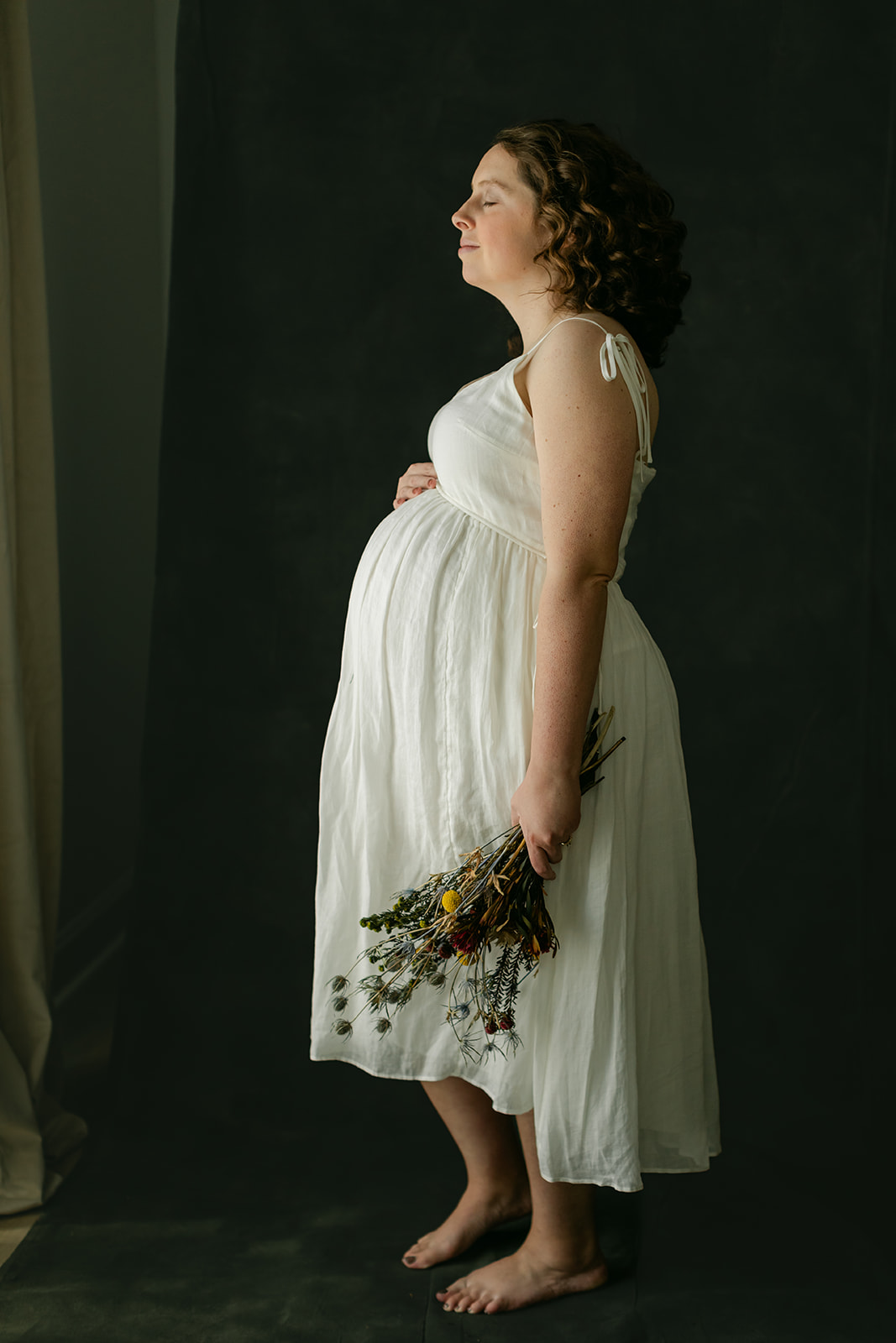 moody maternity session in studio