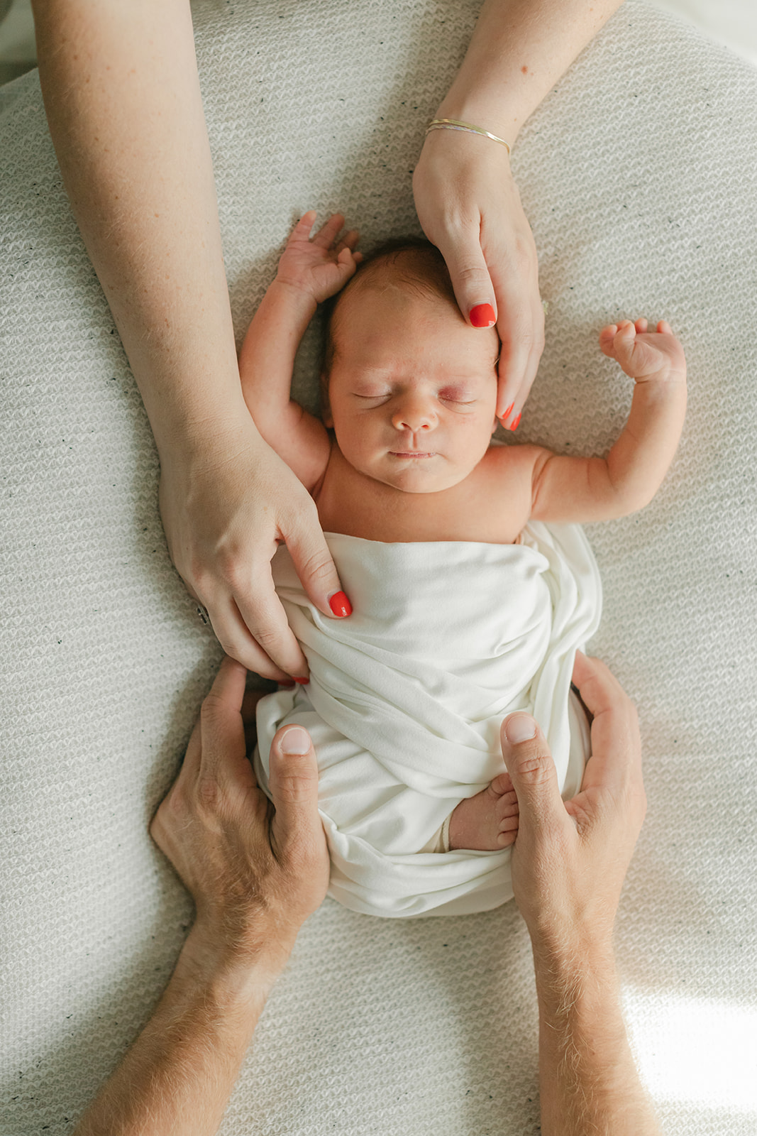 sleepy newborn baby boy