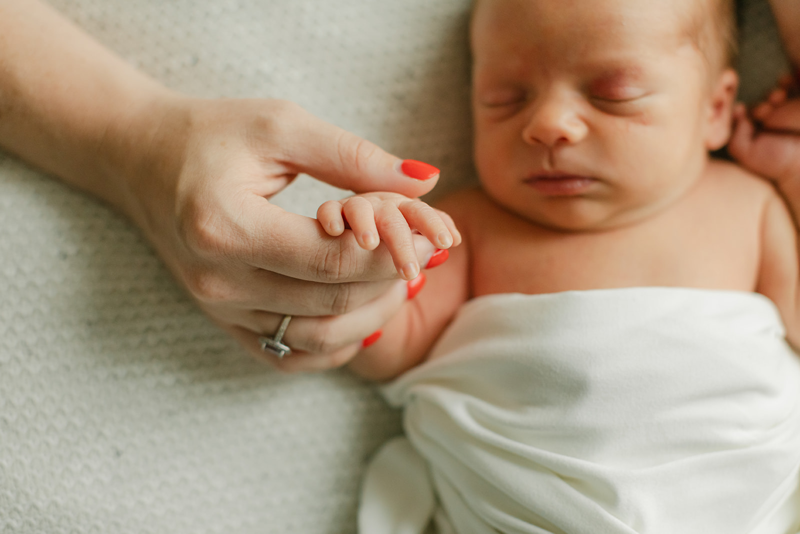sleepy newborn baby boy