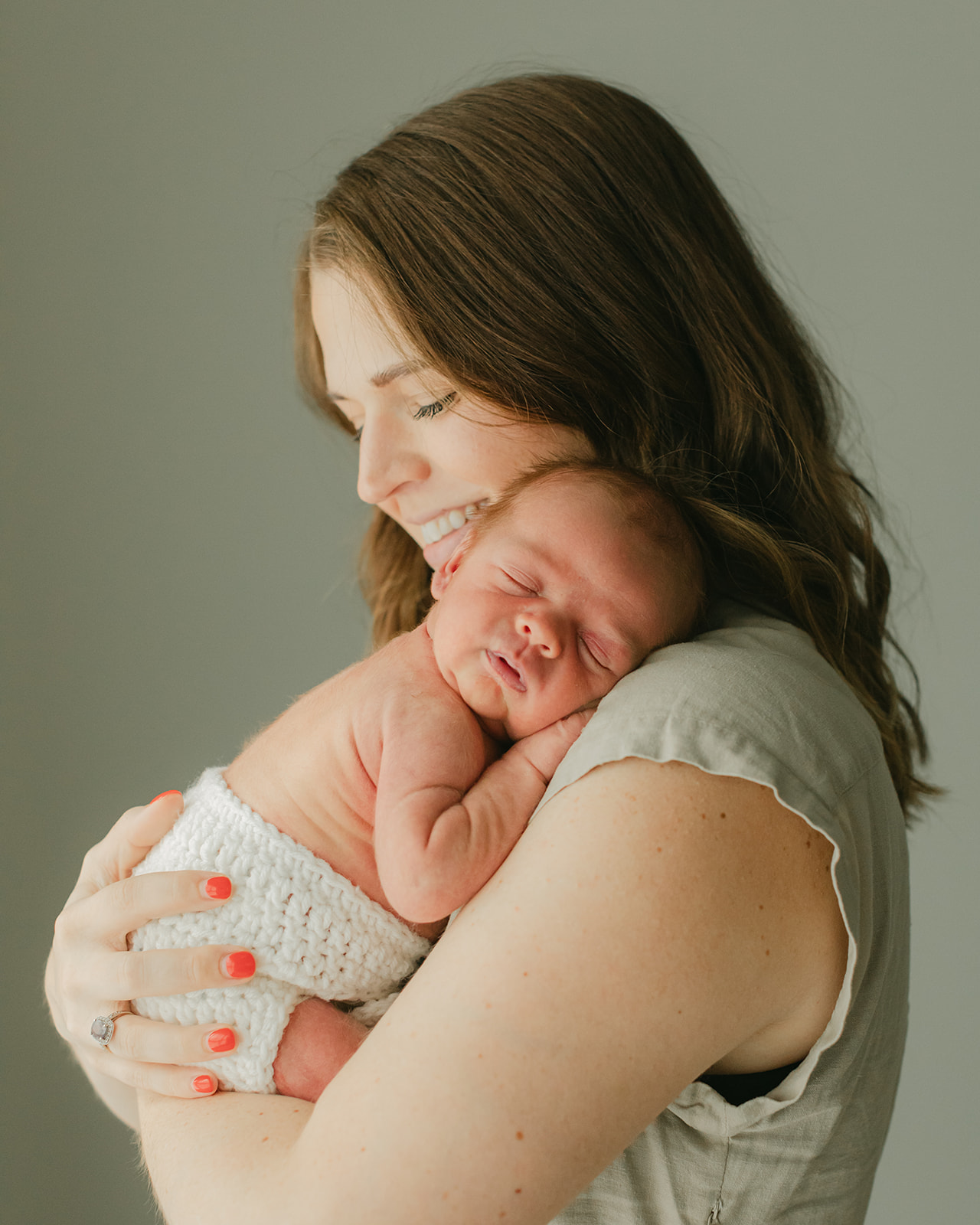 mama and sleepy newborn baby boy