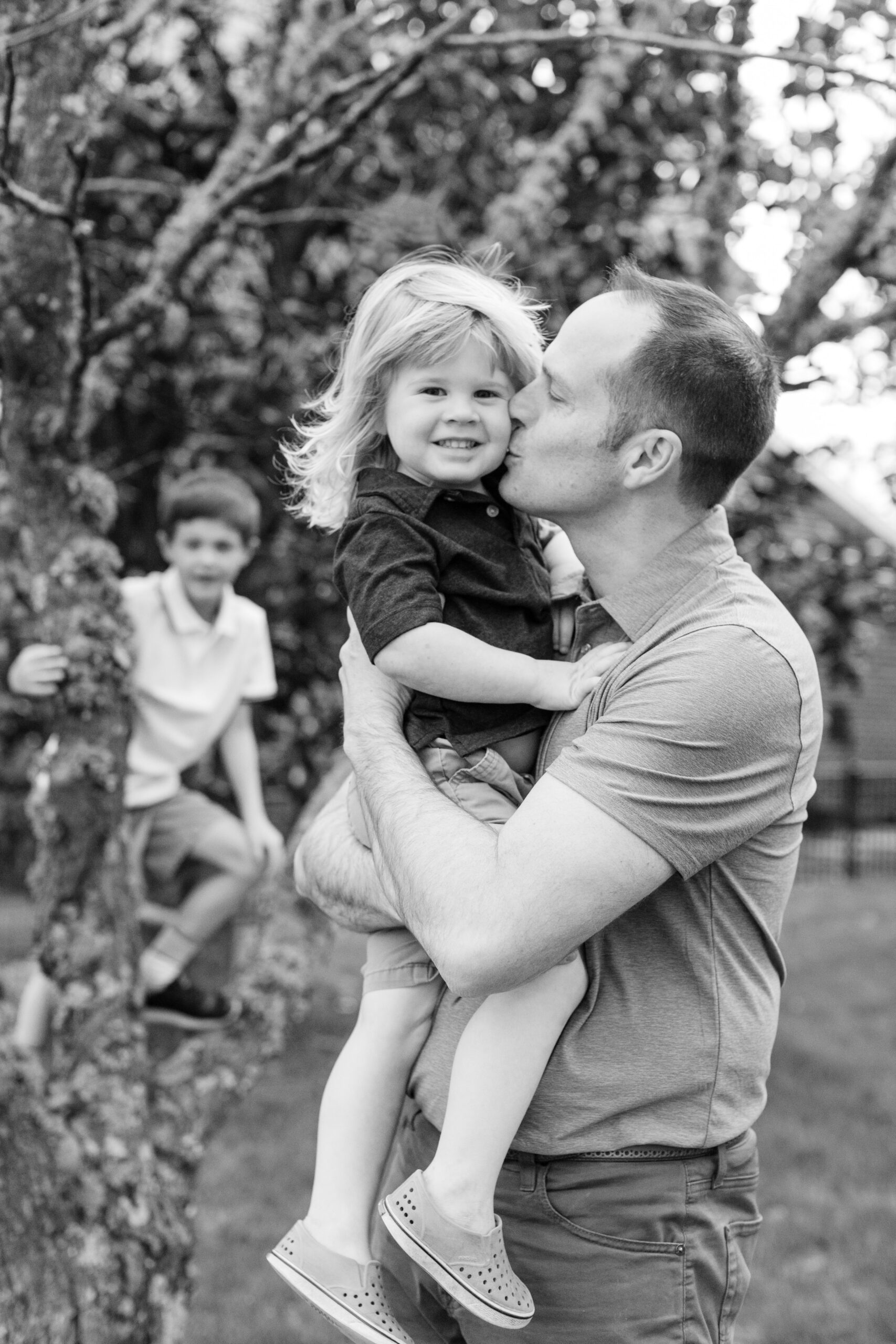 dad and son. outdoor spring family photos. 
