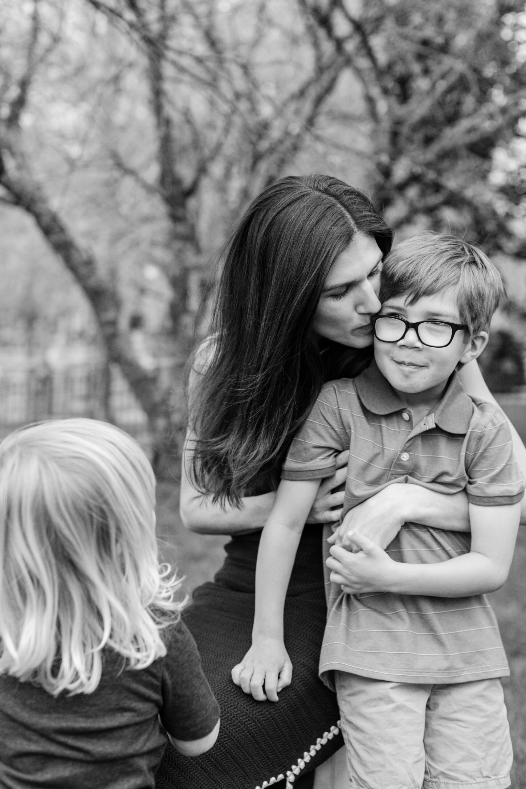 outdoor spring family photos. mom with her three boys