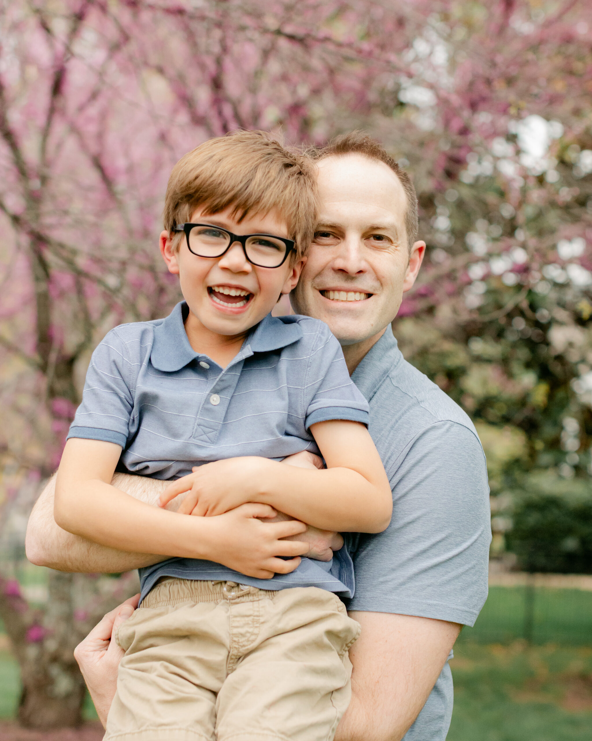 dad and son. outdoor spring family photos. 