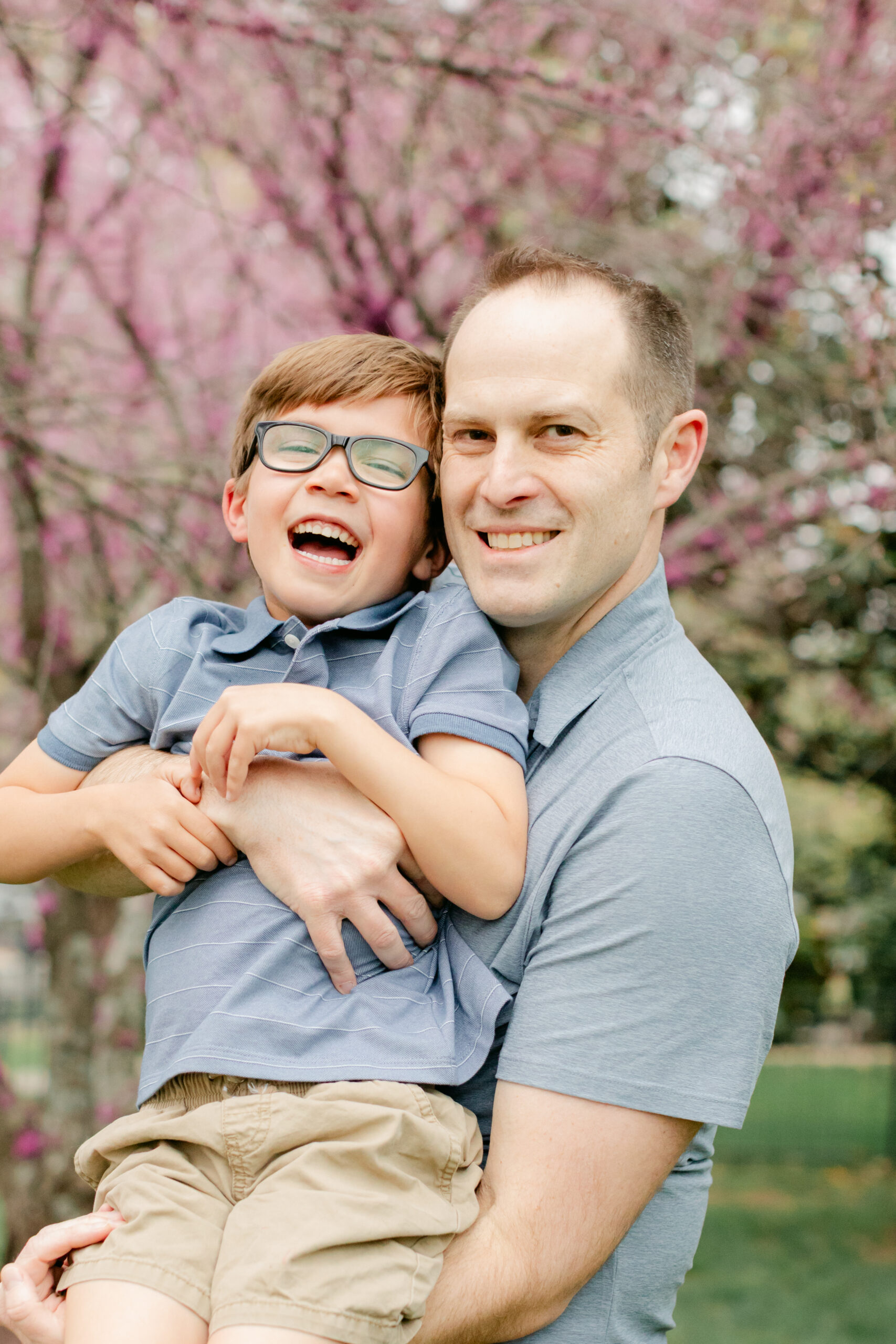 dad and son. outdoor spring family photos. 